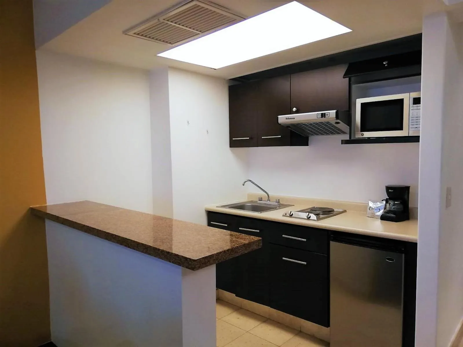 Kitchen or kitchenette in Suites Teca Once
