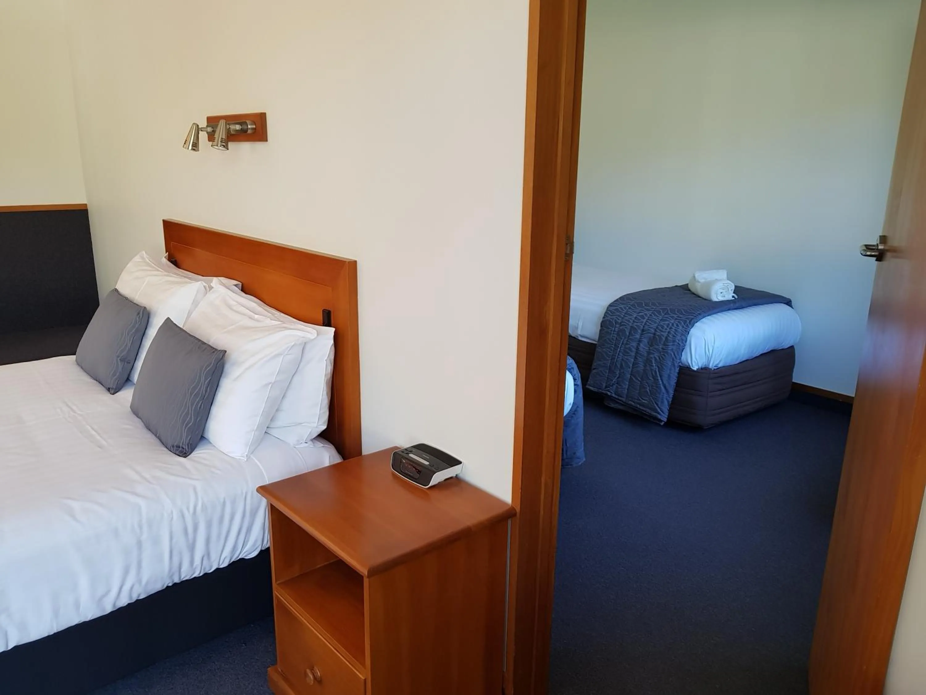 Bed in The Anchor Inn Beachfront Motel