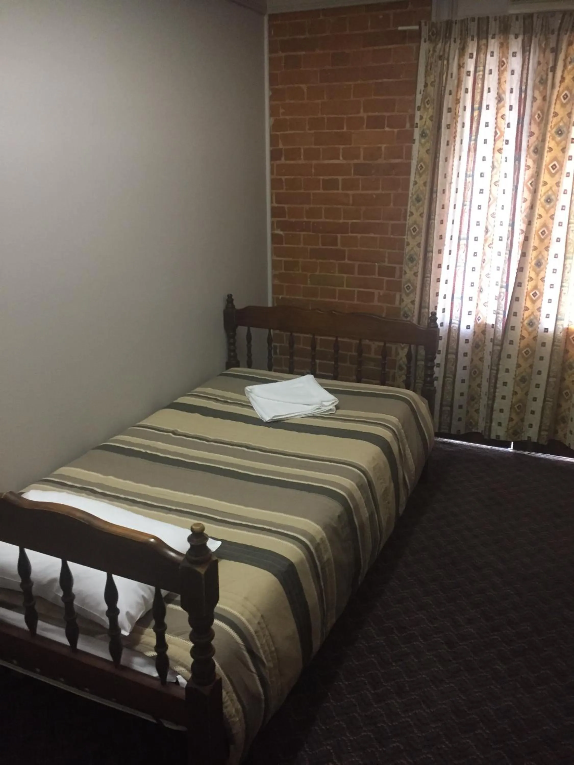 Bed in Heritage Hotel Rockhampton