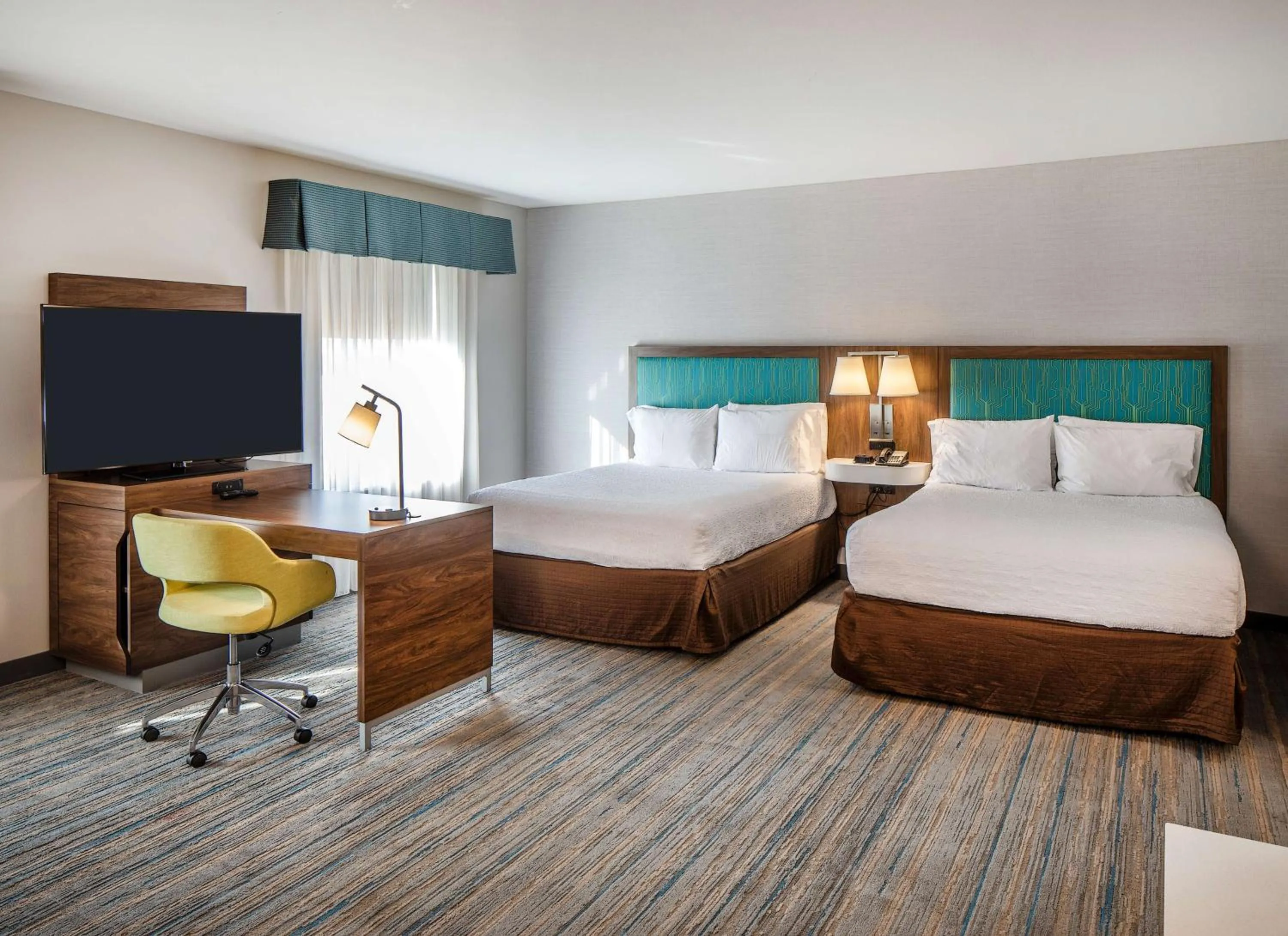 Bed in Hampton Inn & Suites Omaha Southwest-La Vista