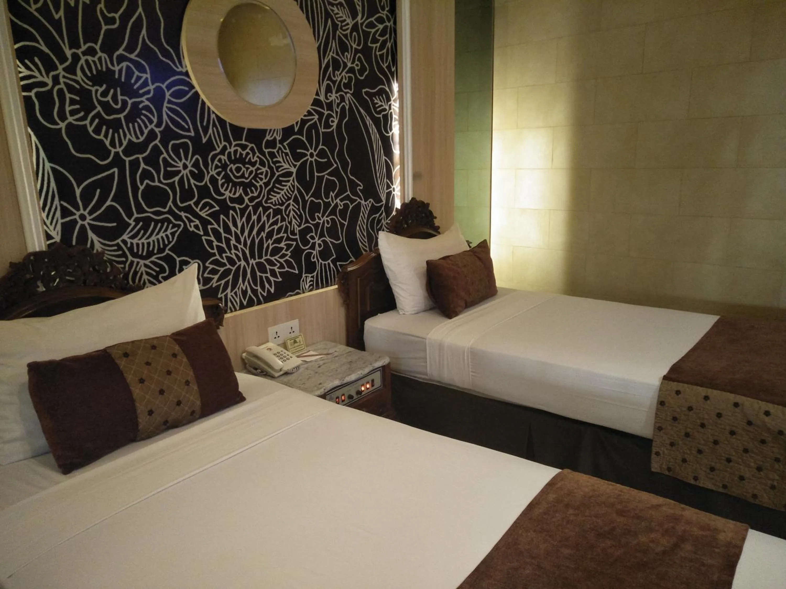 Bed in Hotel Indah Palace Yogyakarta