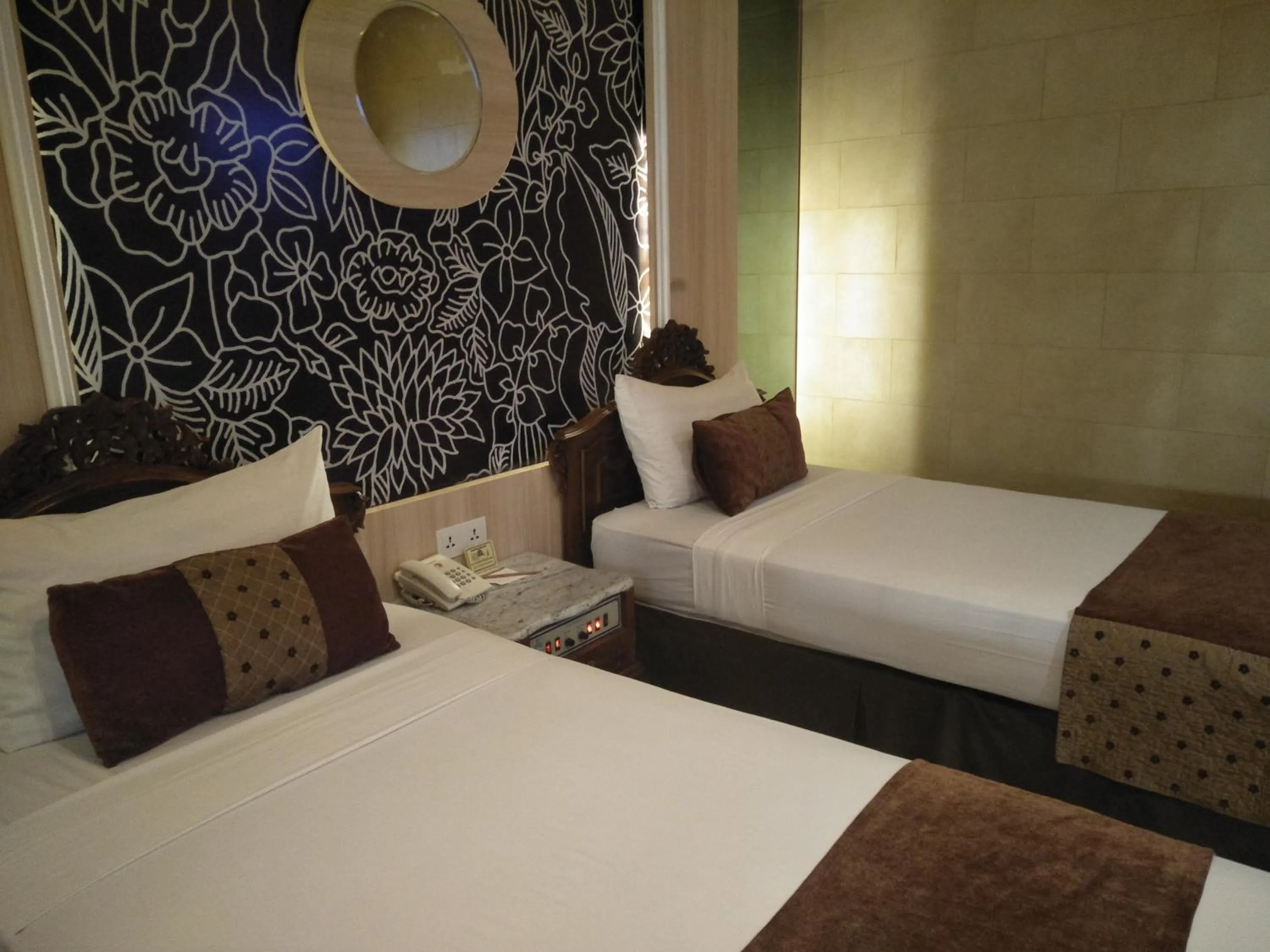 Bed in Hotel Indah Palace Yogyakarta