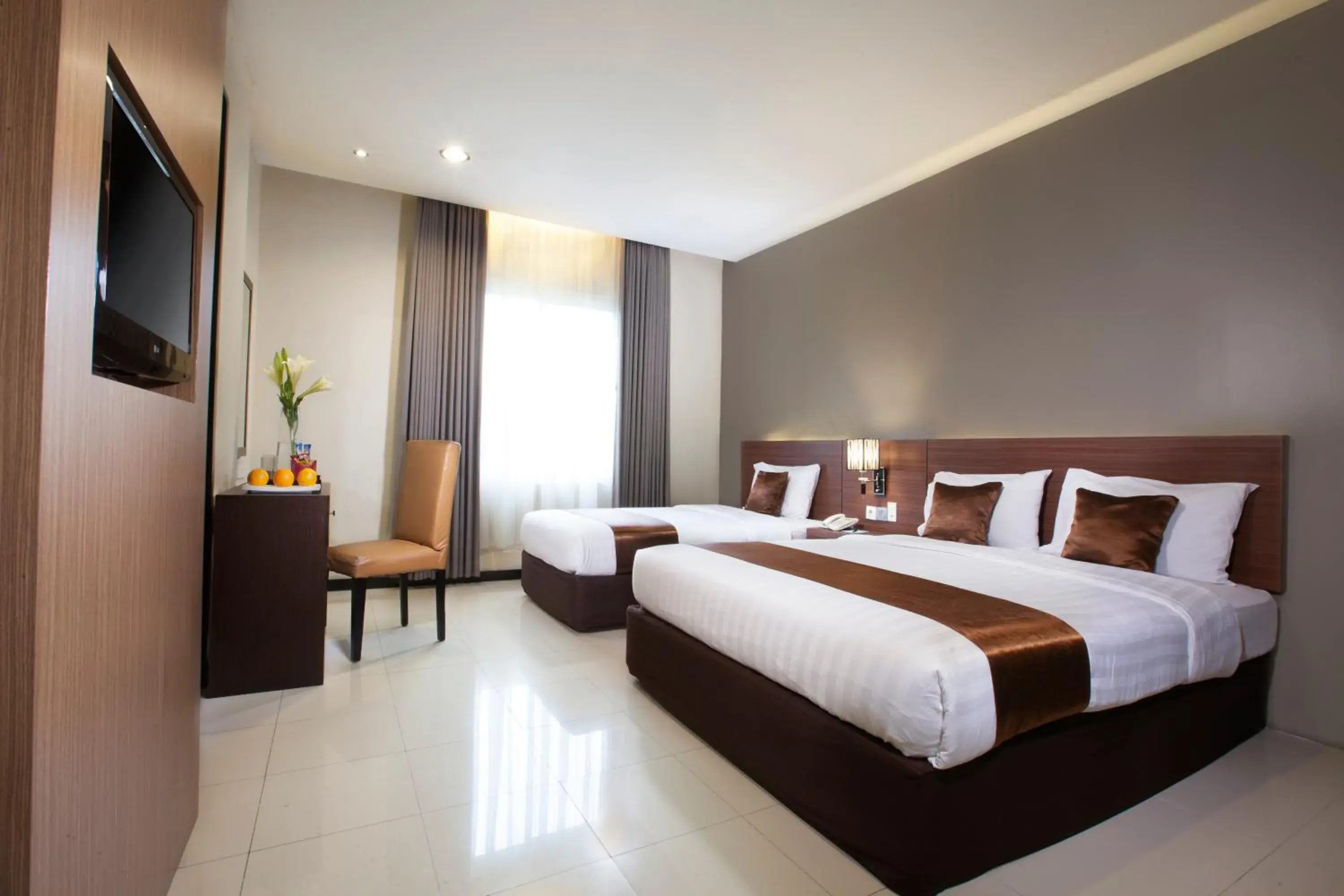 Photo of the whole room, Bed in Regantris Malioboro Photo of the whole room, Bed in Regantris Malioboro