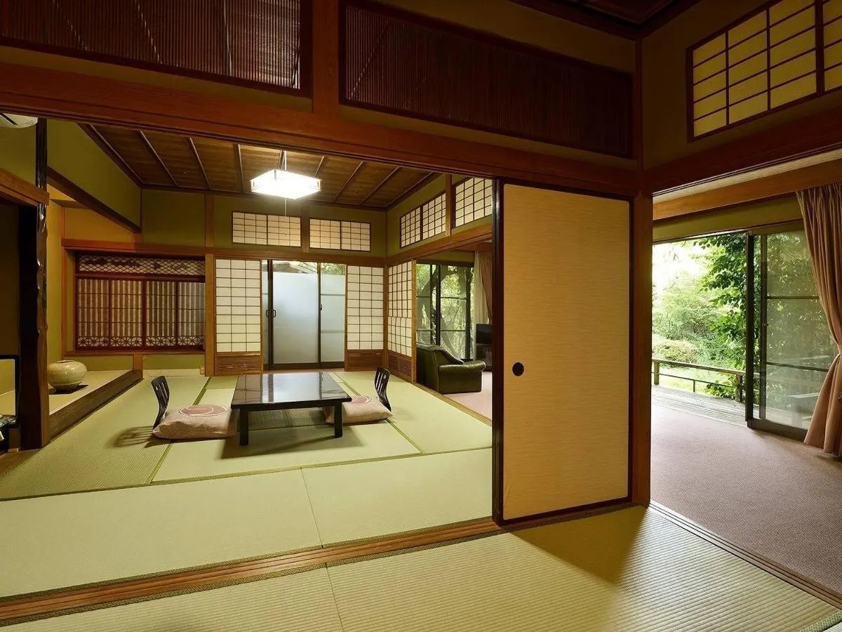 Bed in Itoen Hotel Matsukawakan