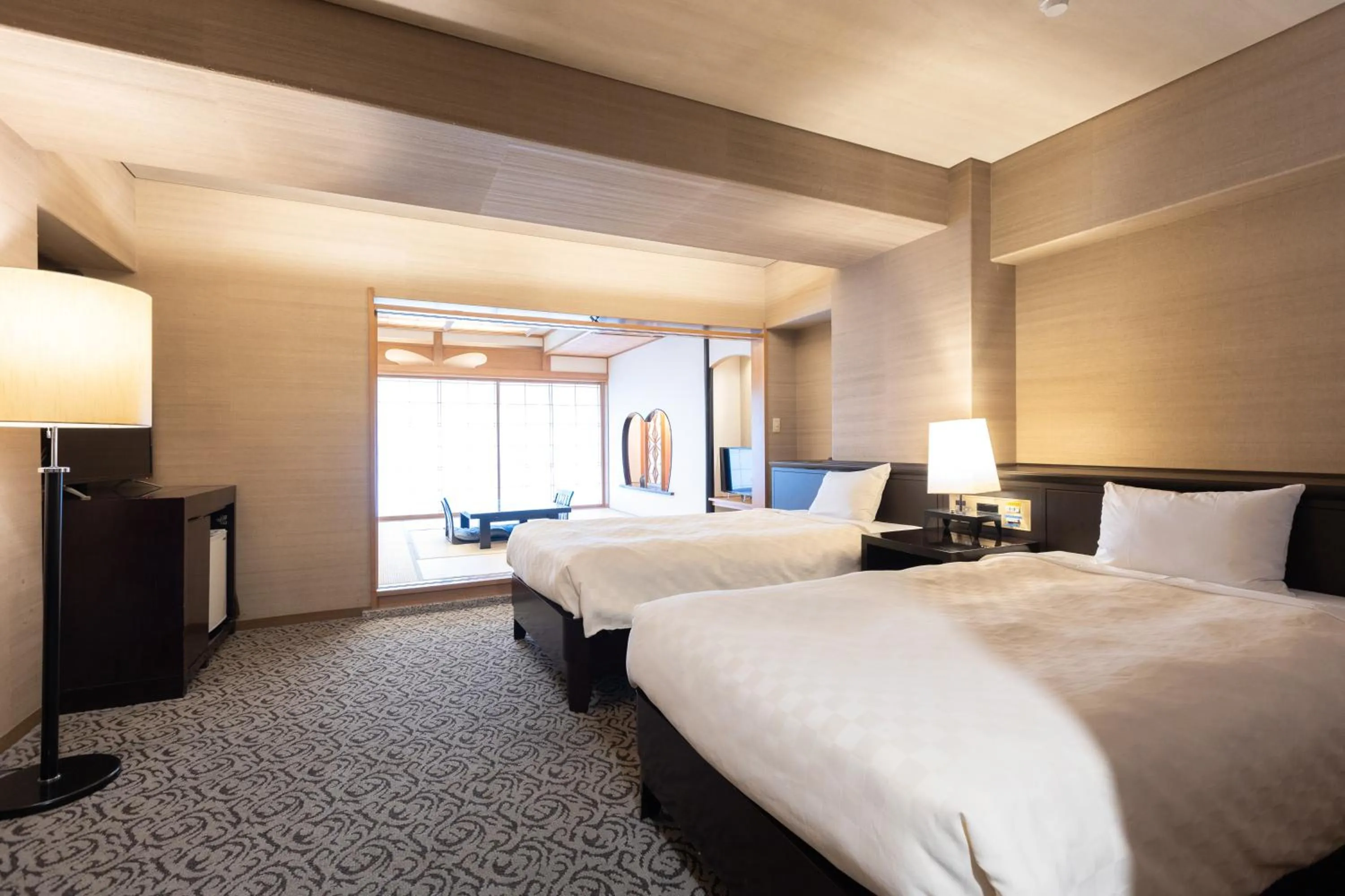 Bed in Atami Season Hotel