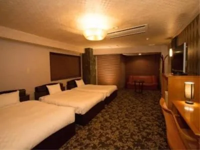 Bed in Atami Season Hotel