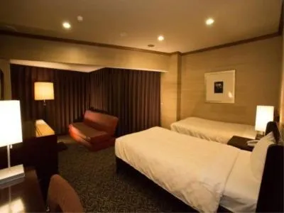 Bed in Atami Season Hotel