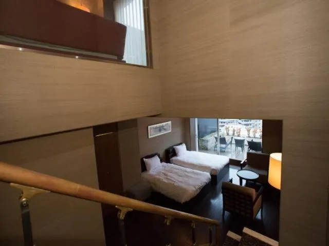 Bed in Atami Season Hotel