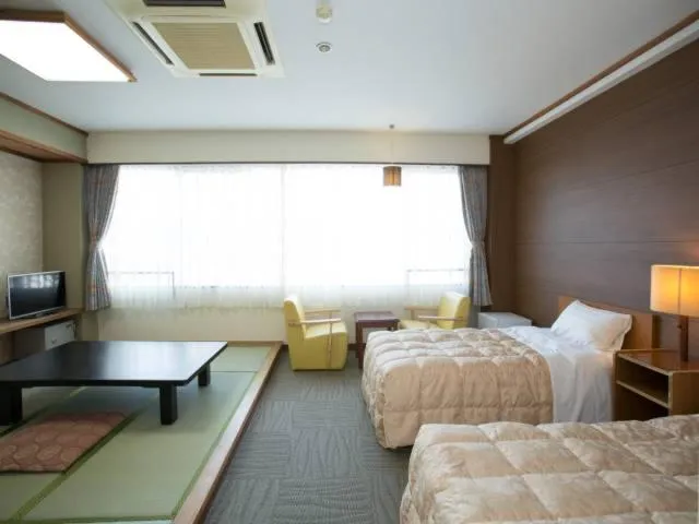Bed in Ikaho Grand Hotel