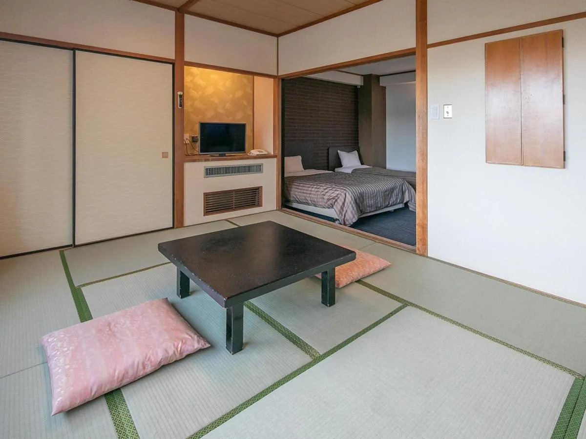 Bed in Ikaho Grand Hotel