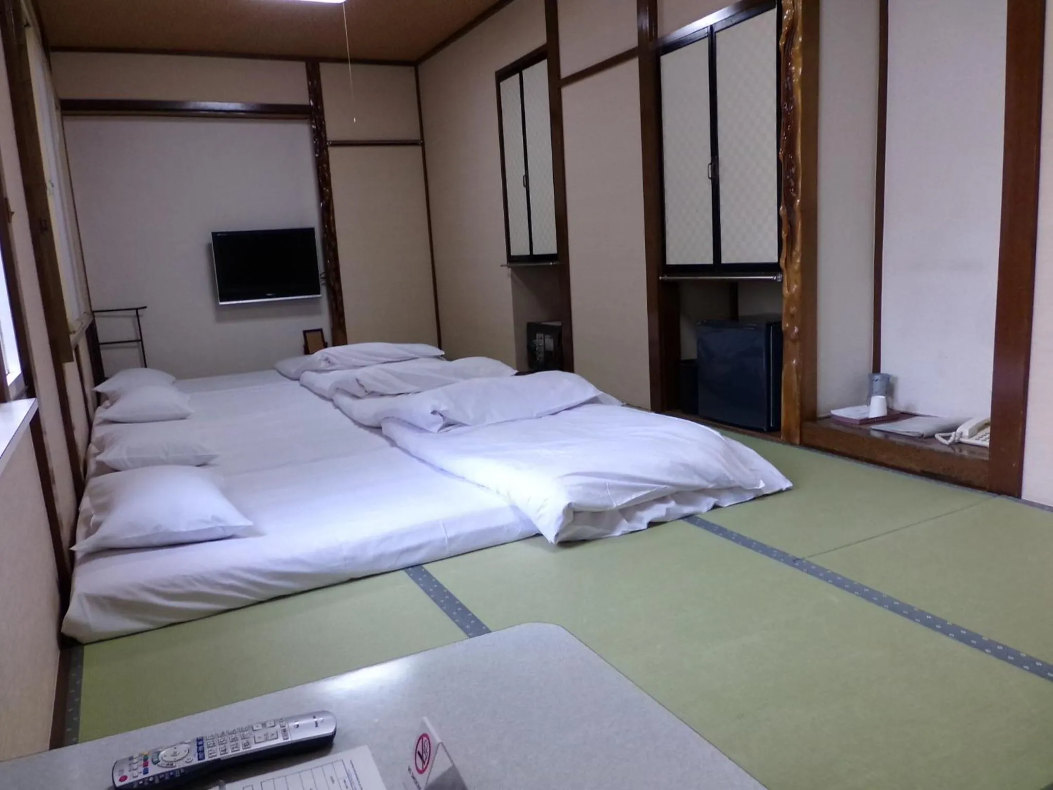 Bed in Minshuku Kuwataniya