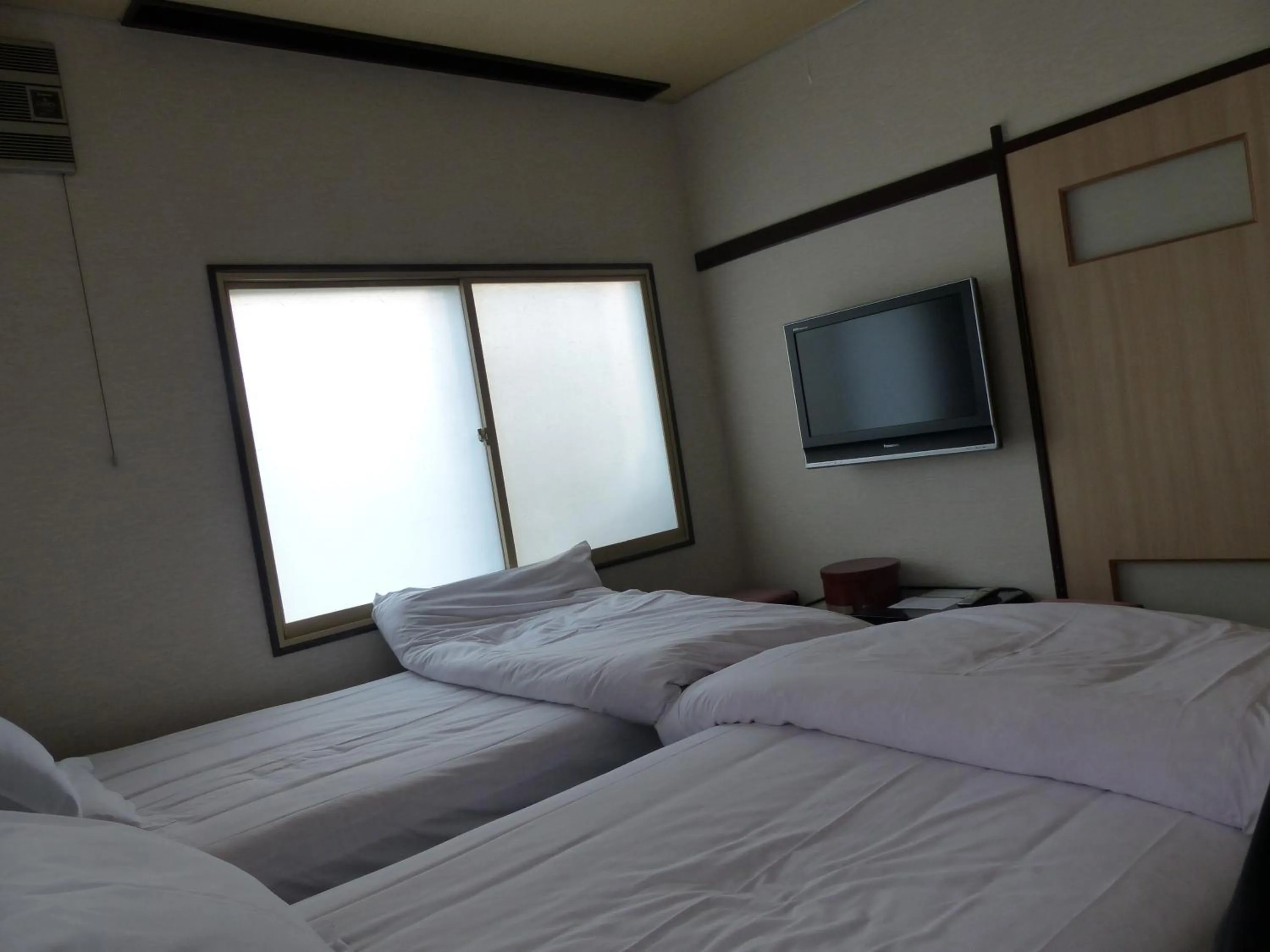 Bed in Minshuku Kuwataniya