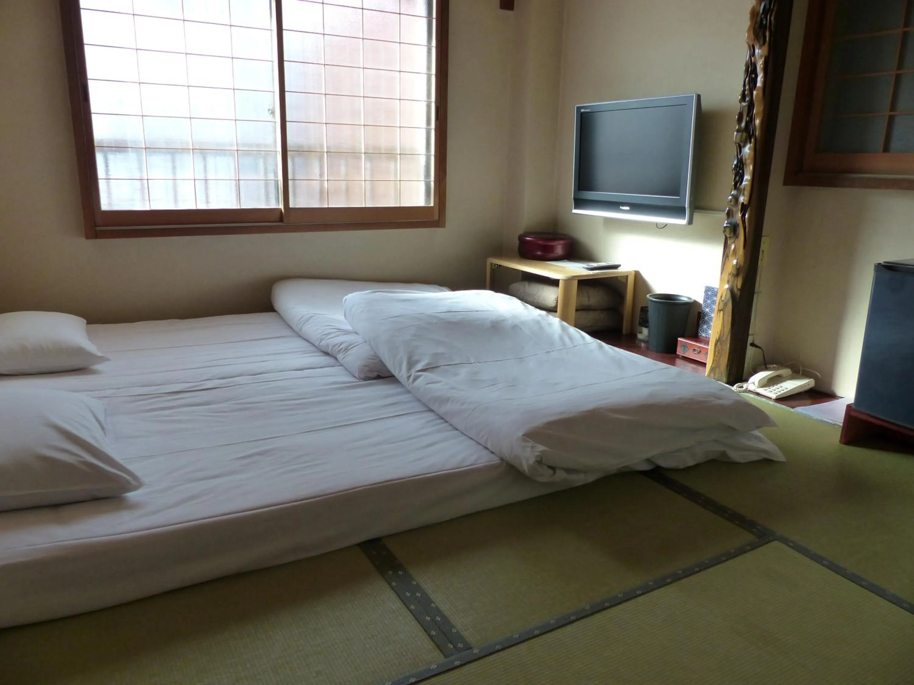 Bed in Minshuku Kuwataniya