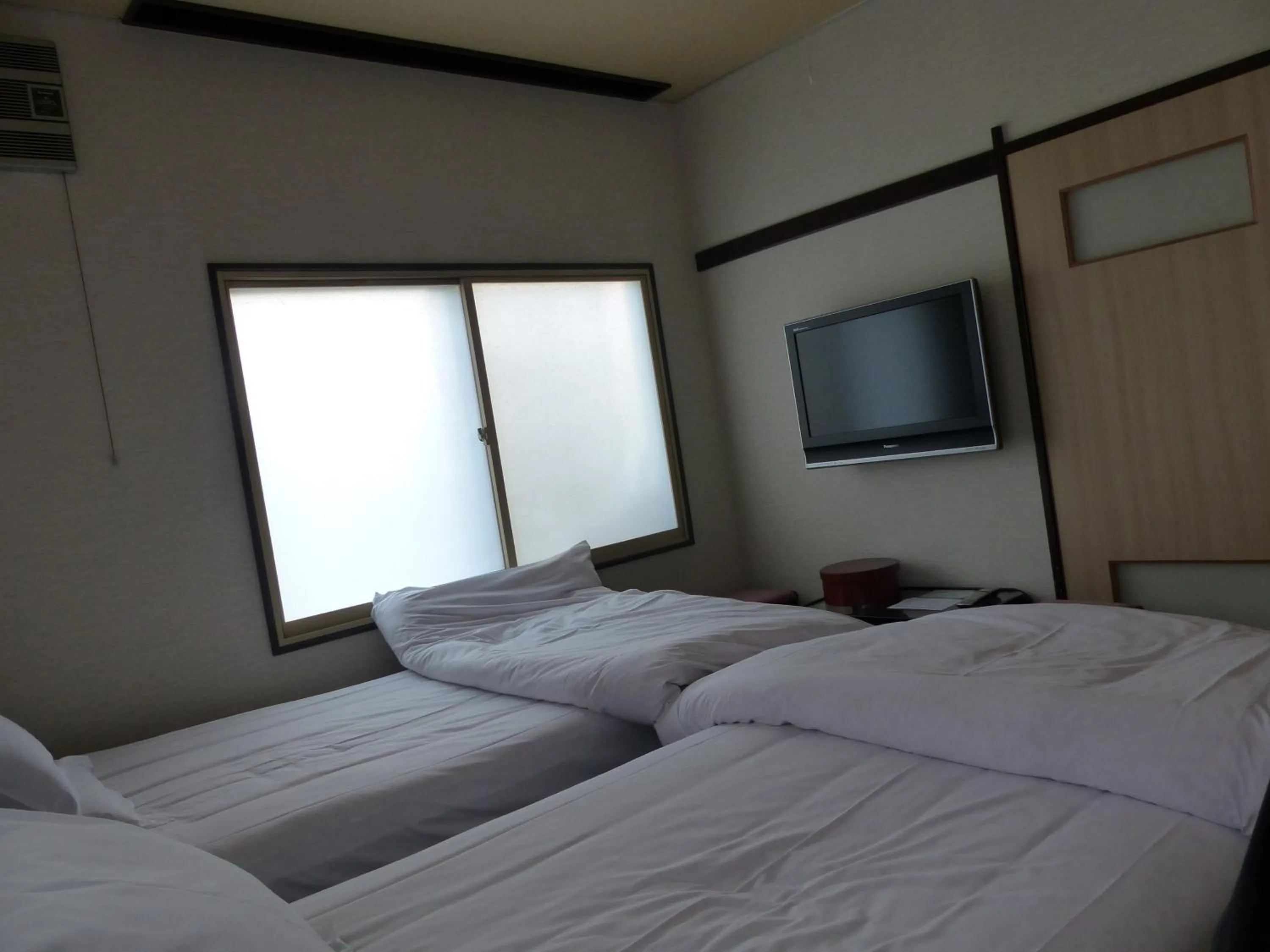 Bed in Minshuku Kuwataniya