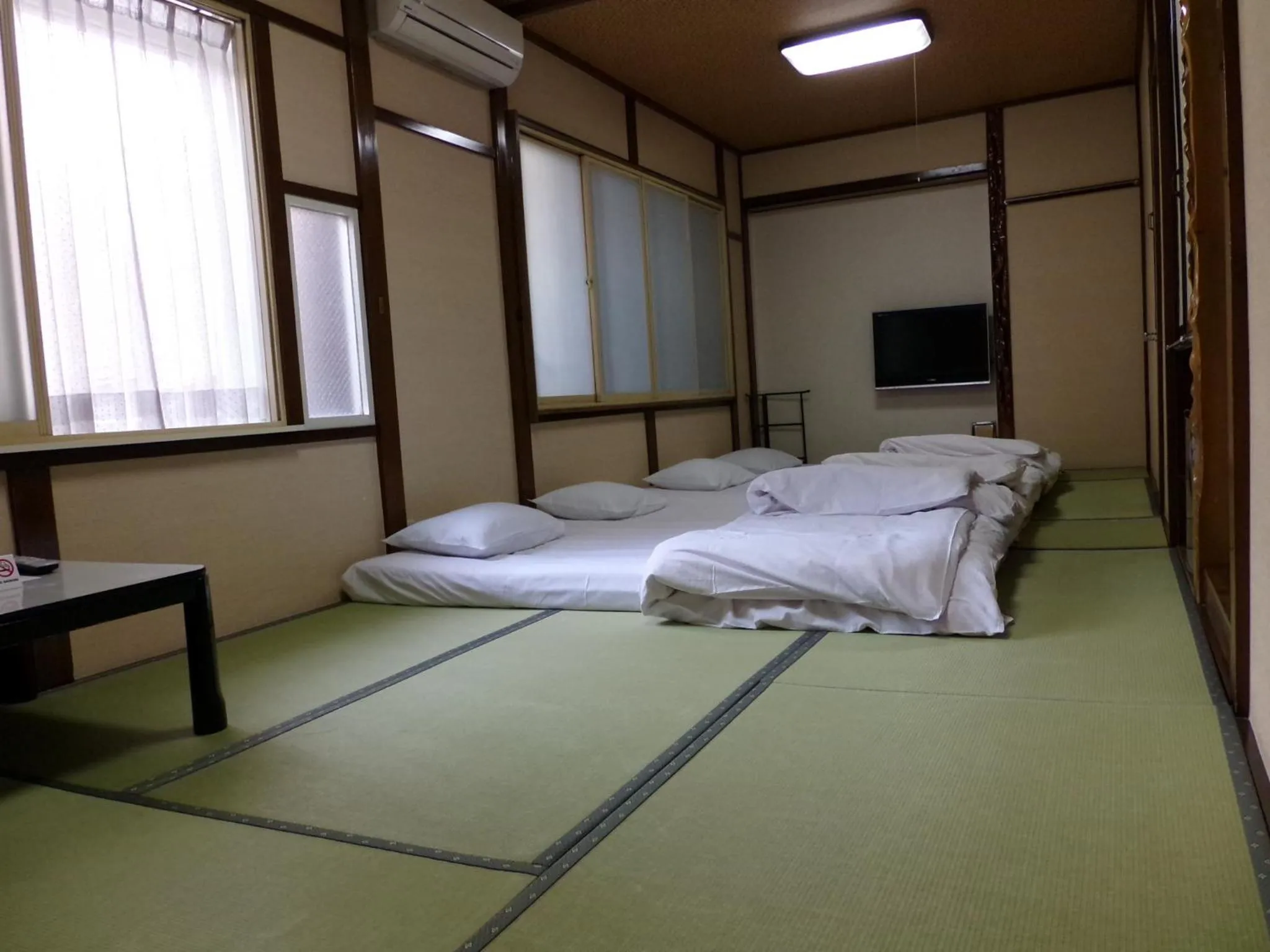 Bed in Minshuku Kuwataniya