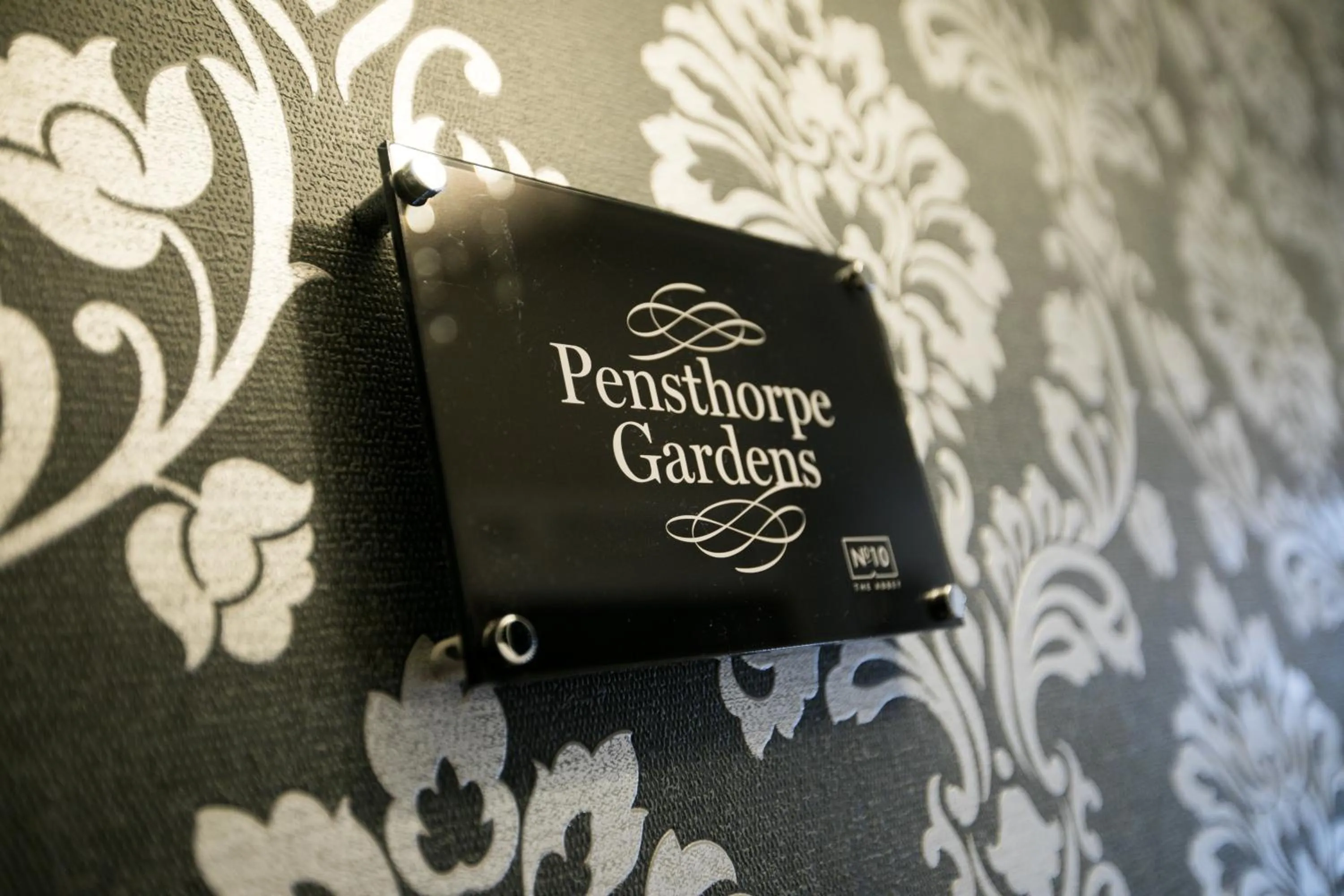 Property logo or sign in Apartments at Number 10 The Abbey