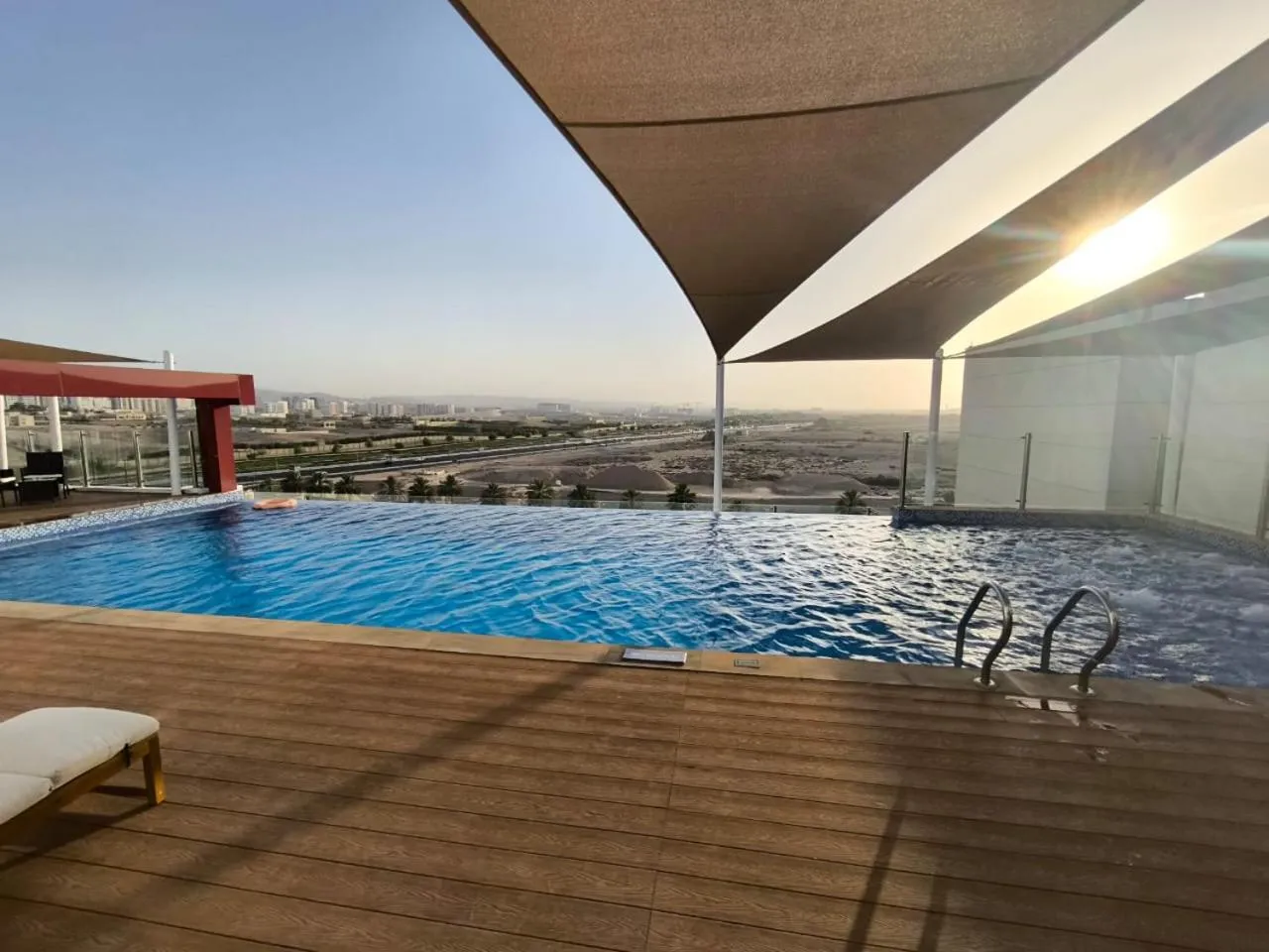 Swimming pool in Carnelian Muscat - Airport Hotel