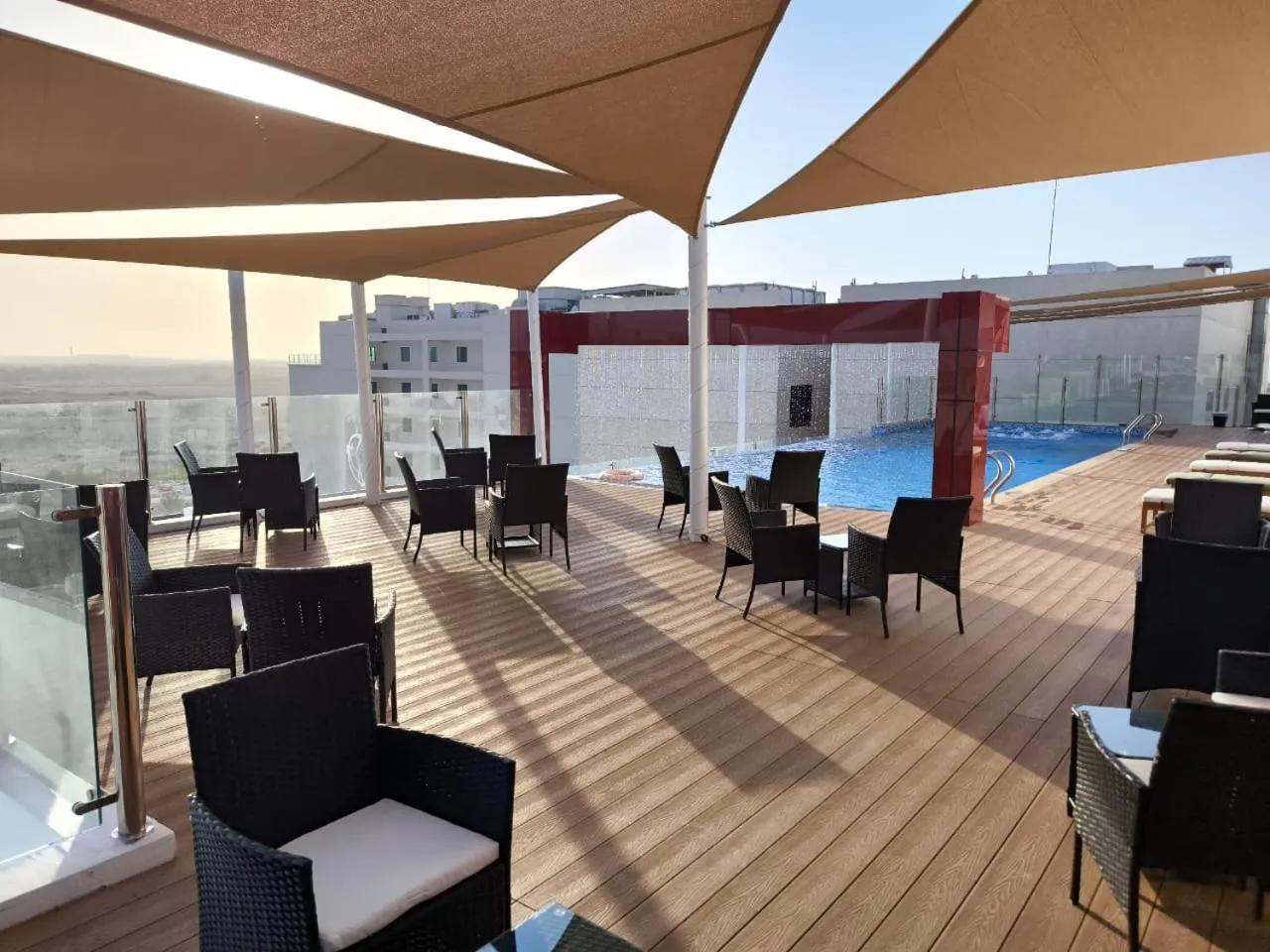 Swimming pool in Carnelian Muscat - Airport Hotel