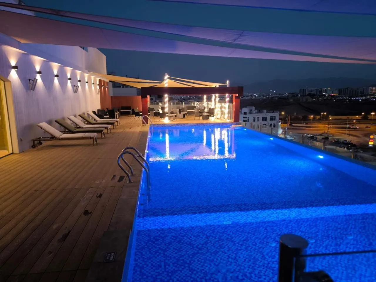 Swimming pool in Carnelian Muscat - Airport Hotel