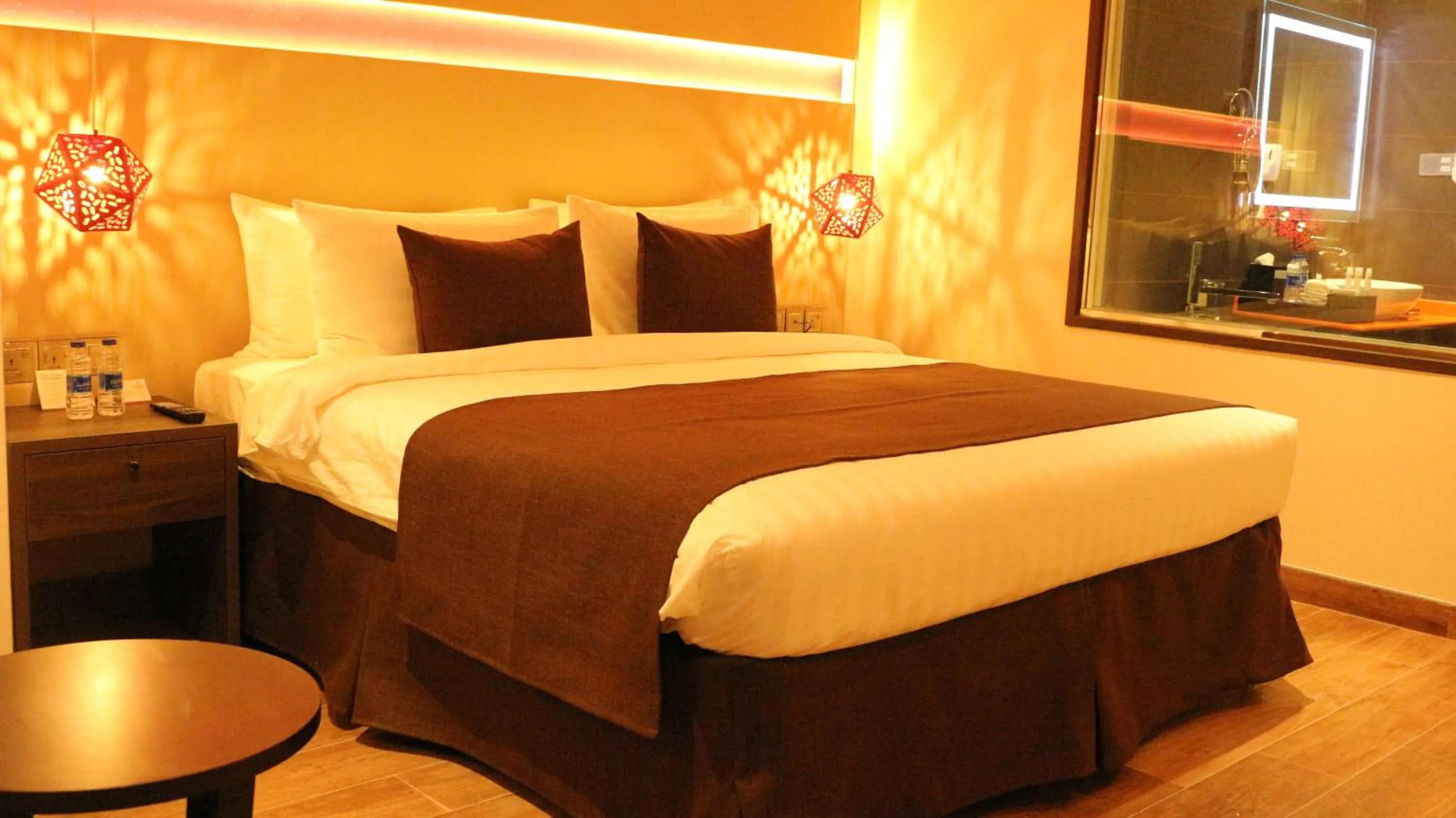 Bed in Carnelian Muscat - Airport Hotel