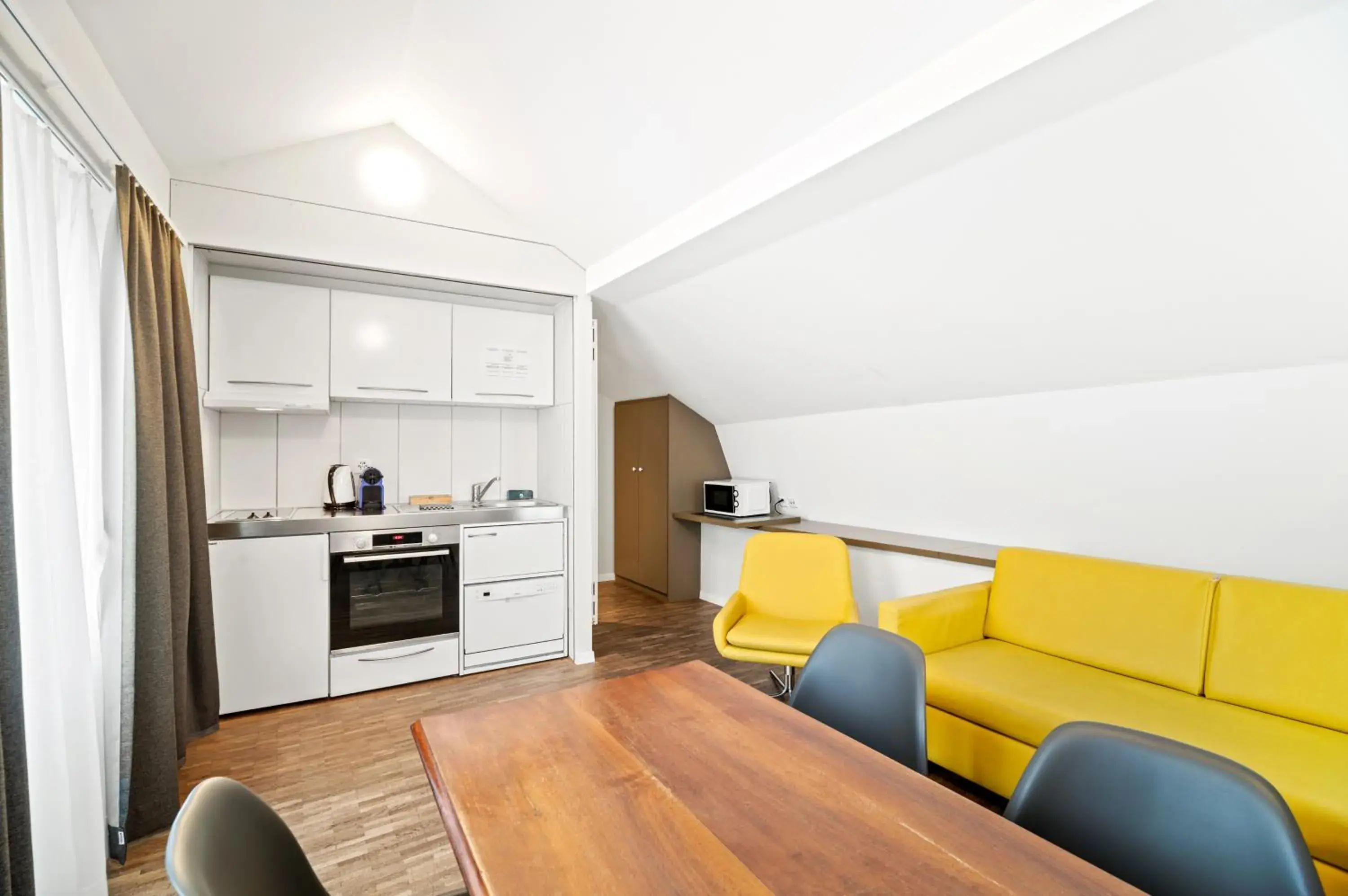 Maisonette Two-Bedroom Apartment with Kitchenette and Balcony in Aparthotel Hine Adon Fribourg Maisonette Two-Bedroom Apartment with Kitchenette and Balcony in Aparthotel Hine Adon Fribourg