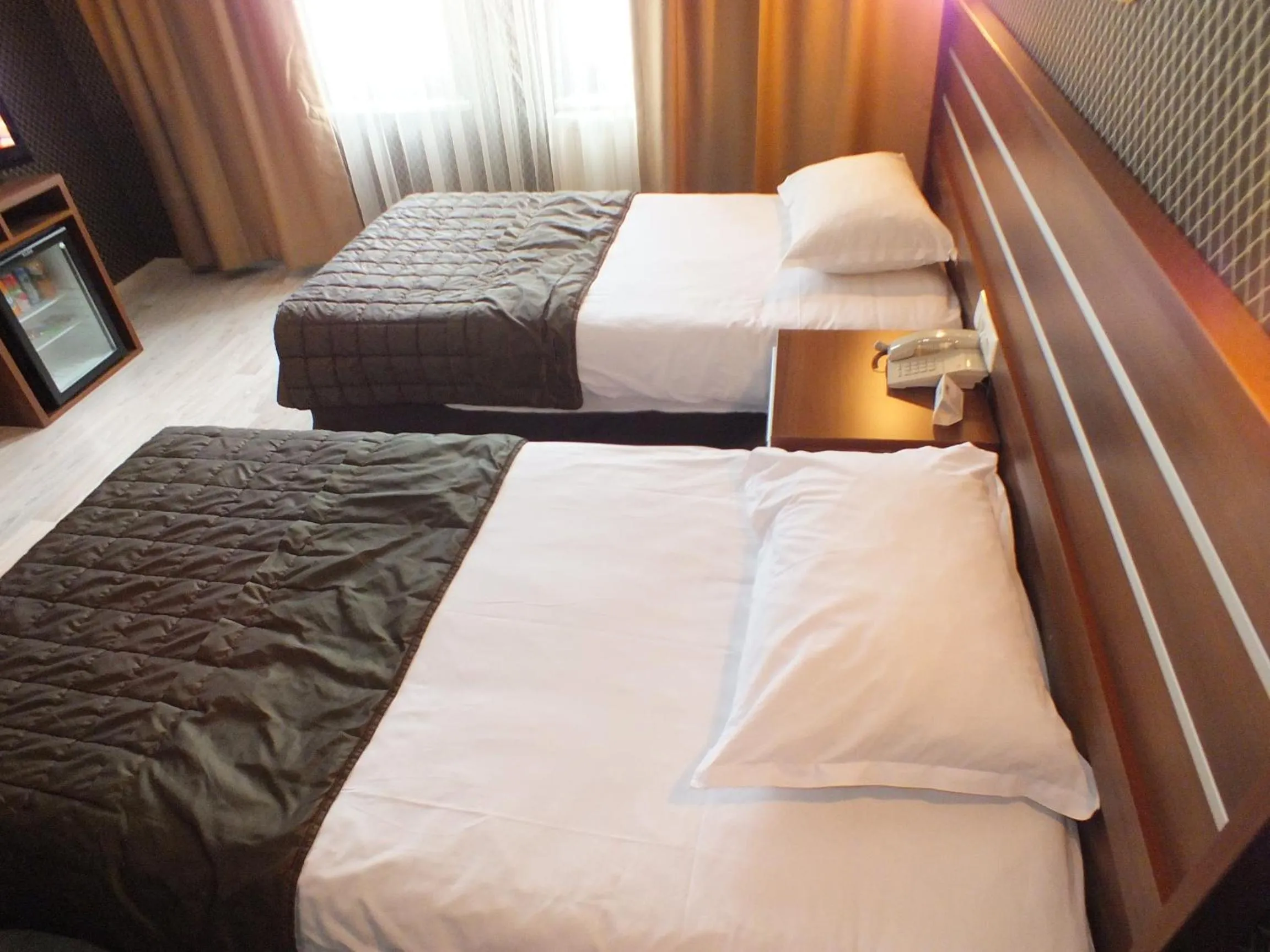 Bed in Lifos Hotel