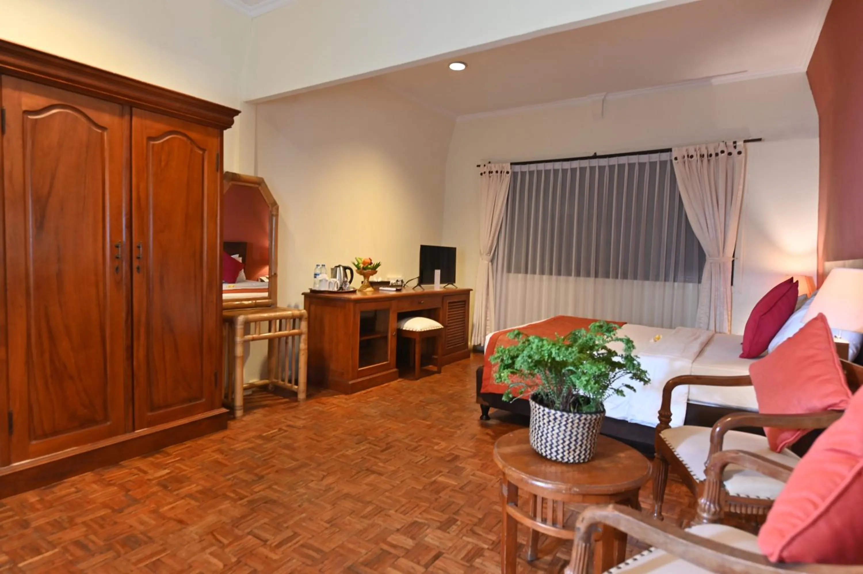 Bedroom in Puri Dewa Bharata Hotel & Villas