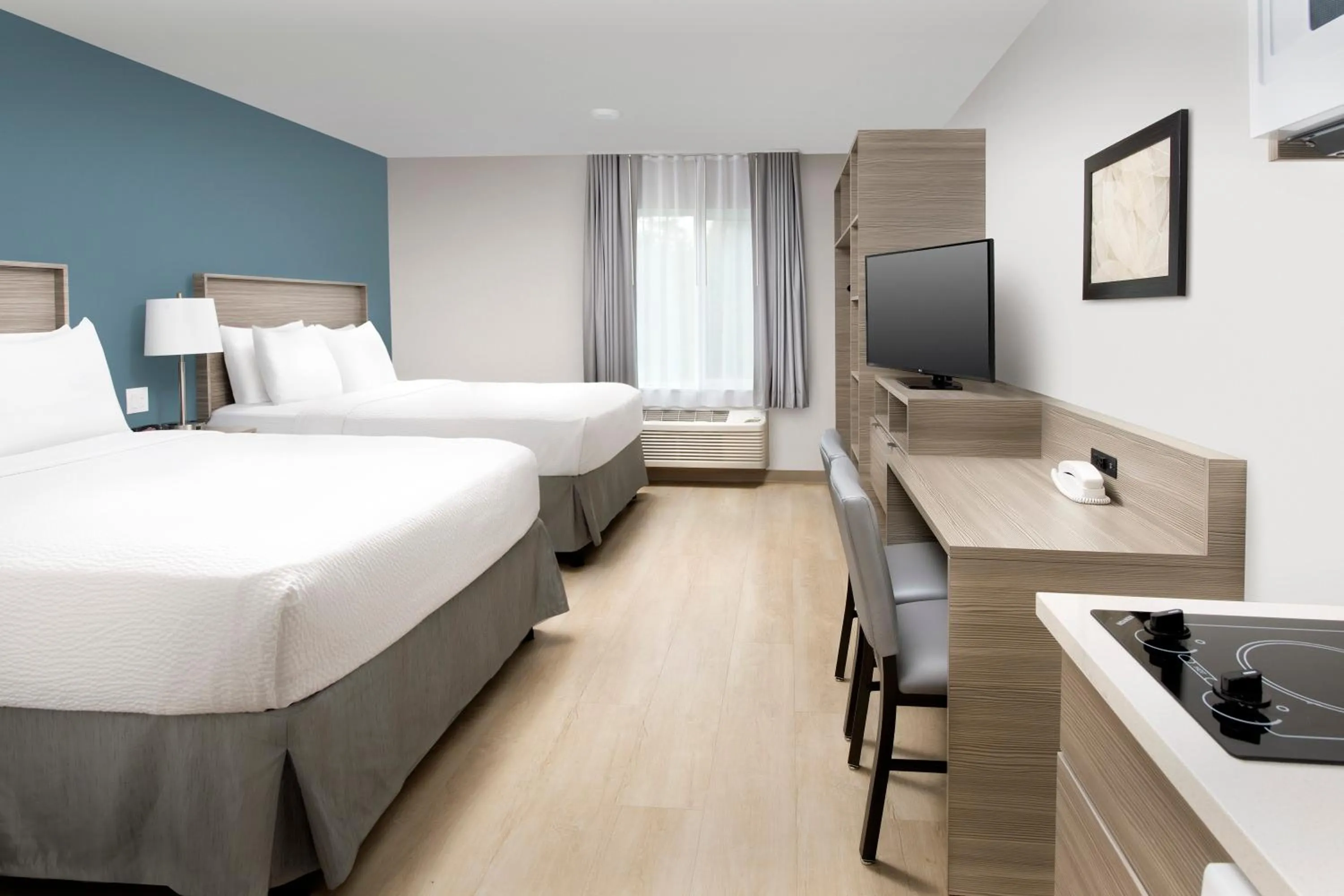 Photo of the whole room, Bed in WoodSpring Suites Seattle Redmond