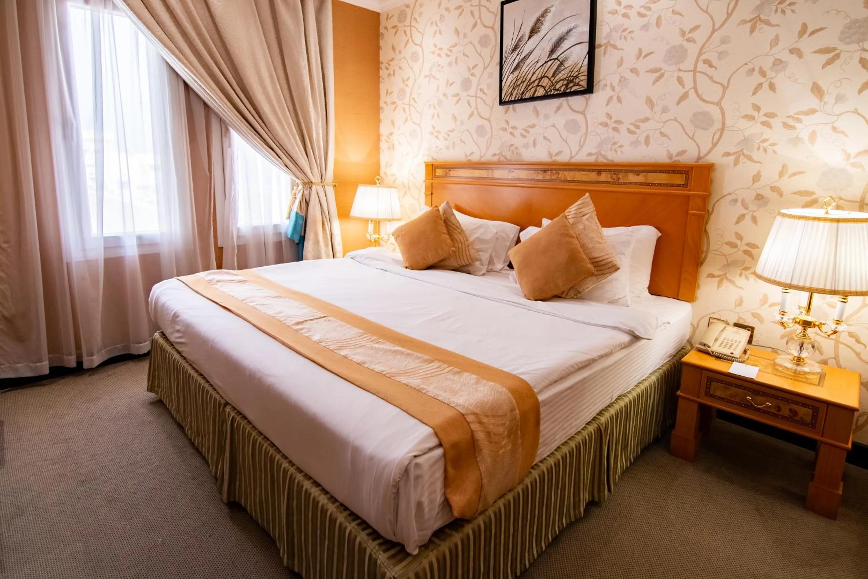 Bed in Garden Hotel Muscat By Royal Titan Group