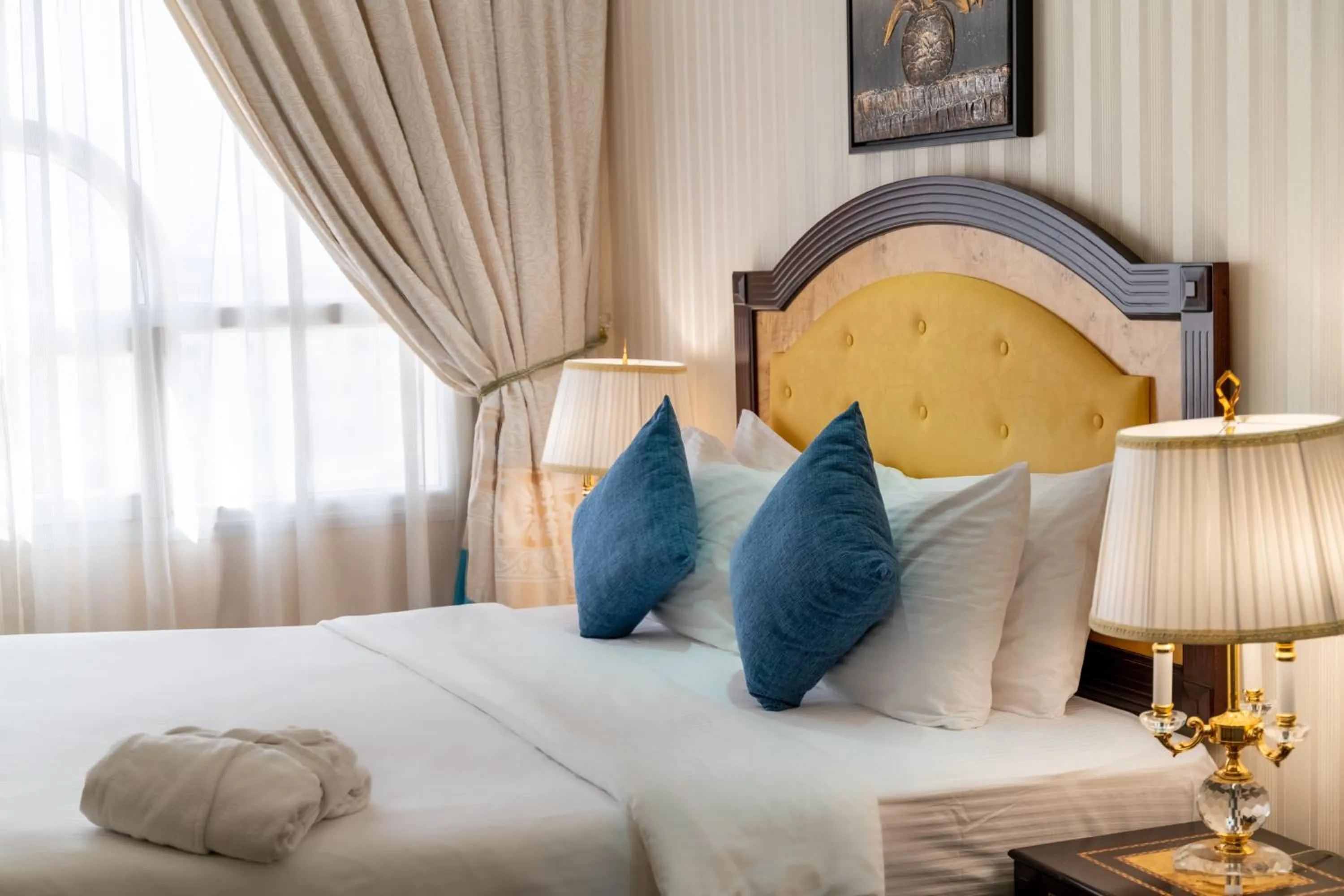 Bed in Garden Hotel Muscat By Royal Titan Group