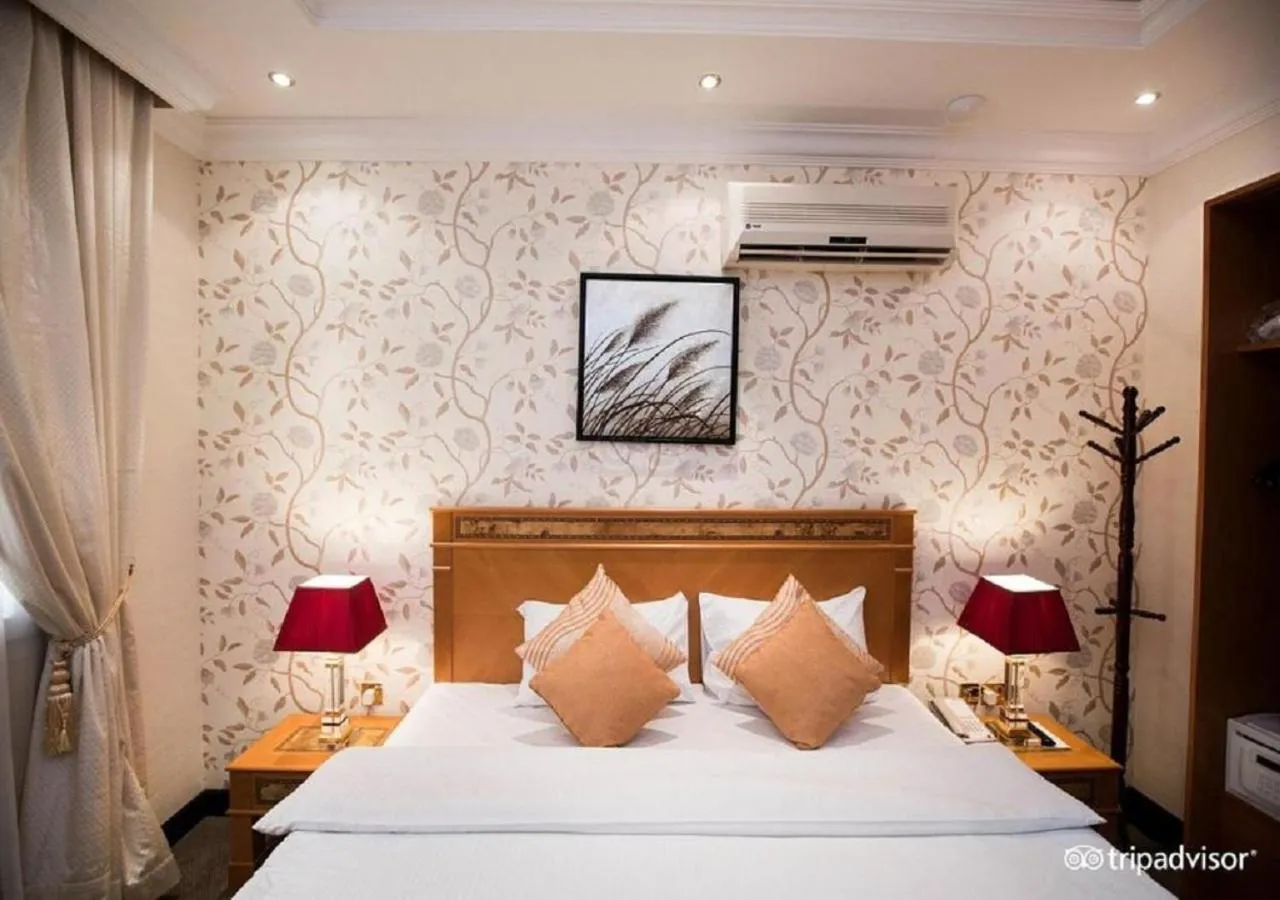 Bed in Garden Hotel Muscat By Royal Titan Group