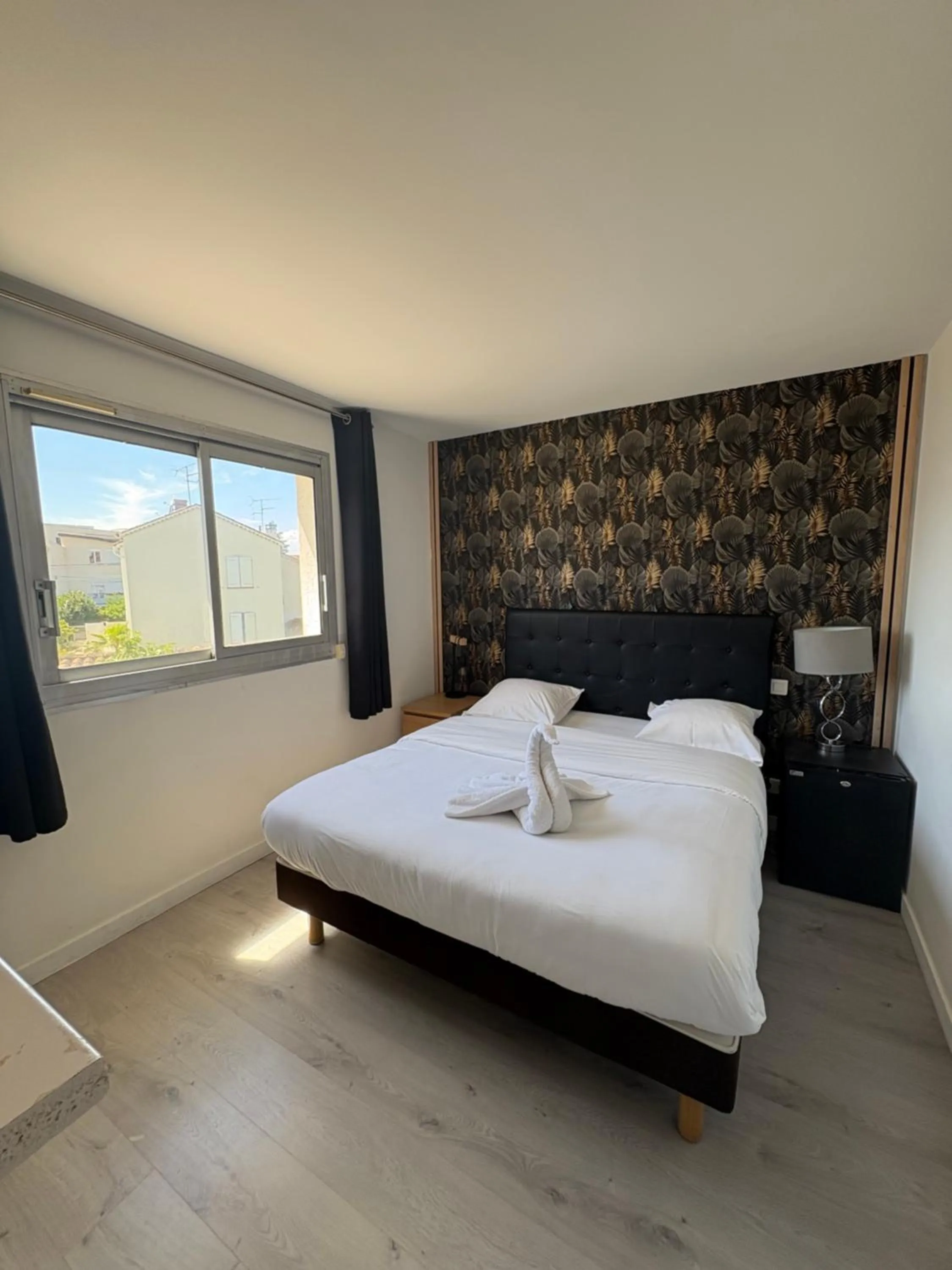 Bed in Hotel Sable Et Soleil - Port, Plage & Jacuzzi privé