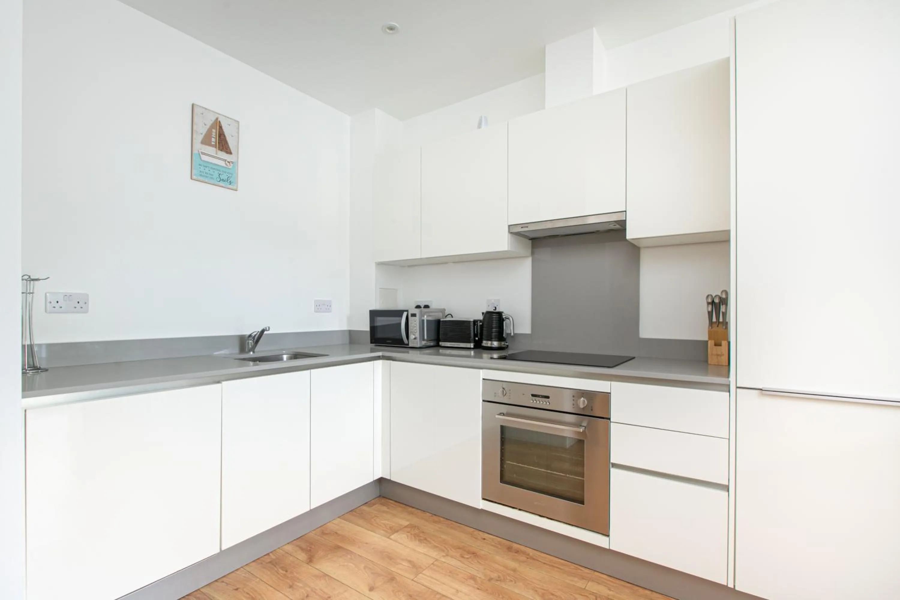 kitchen in Skyvillion - COZY APARTMENTS in Enfield Town With Free Parking & Wifi