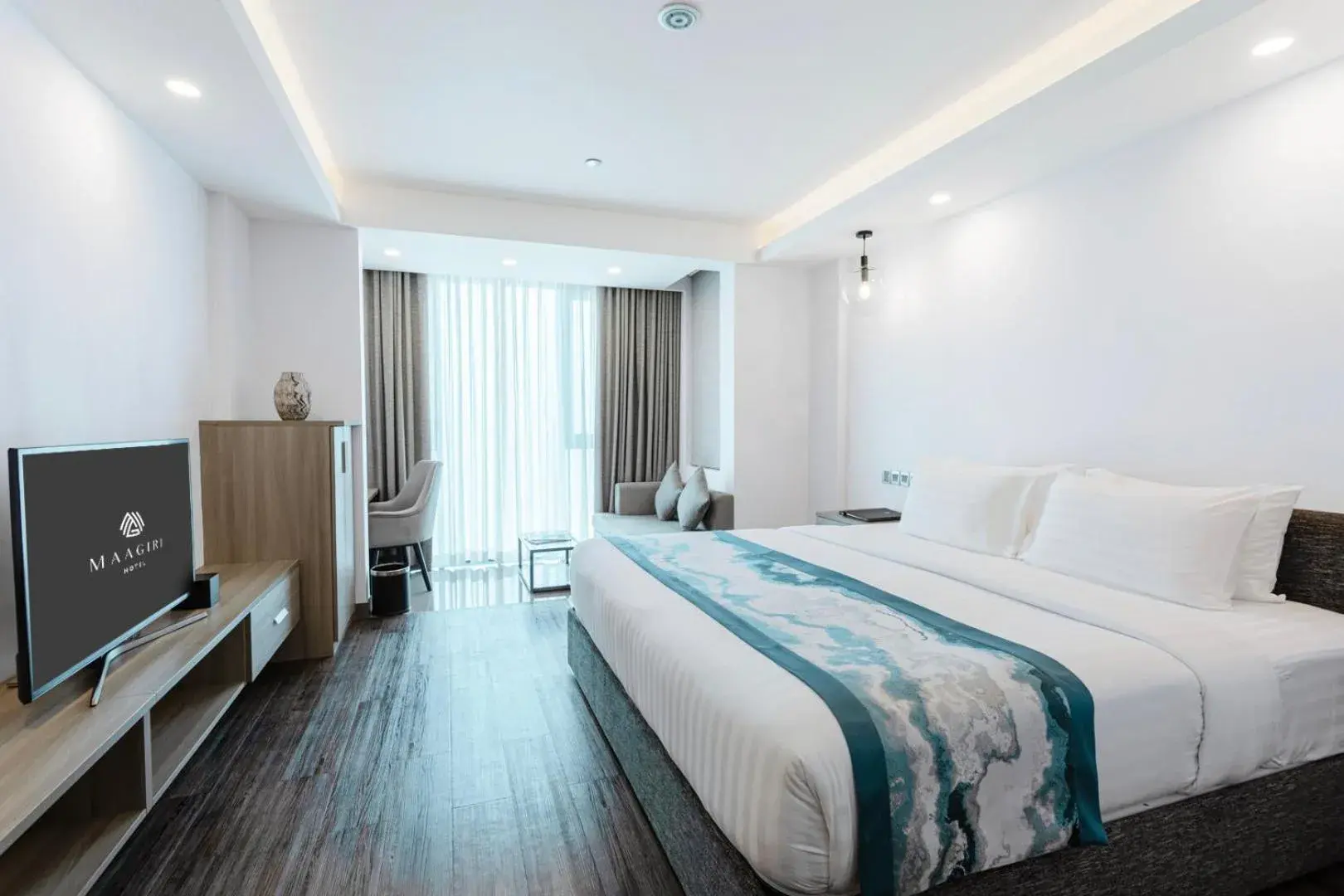 Bed in Maagiri Hotel Bed in Maagiri Hotel