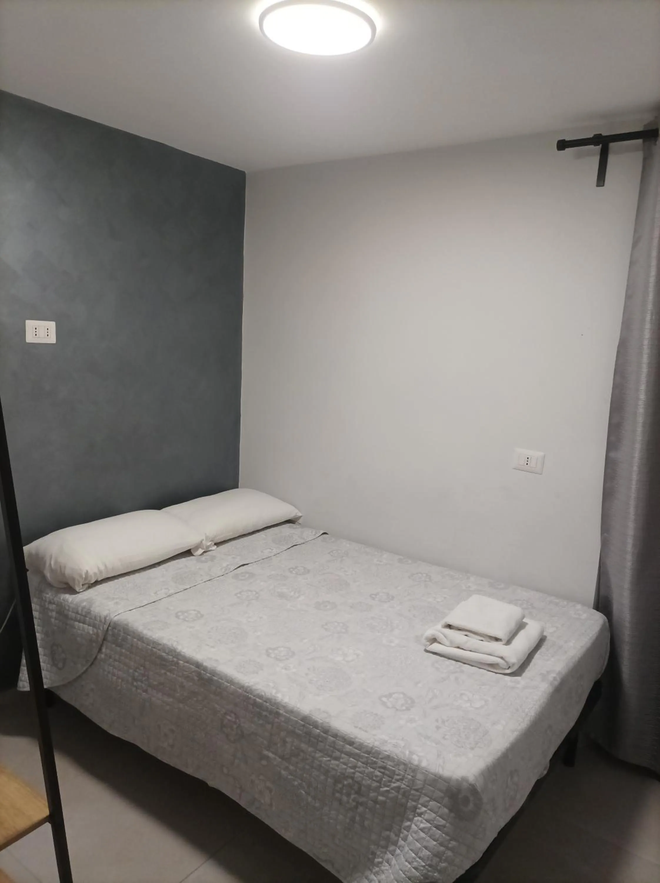 Photo of the whole room, Bed in Sun Moon