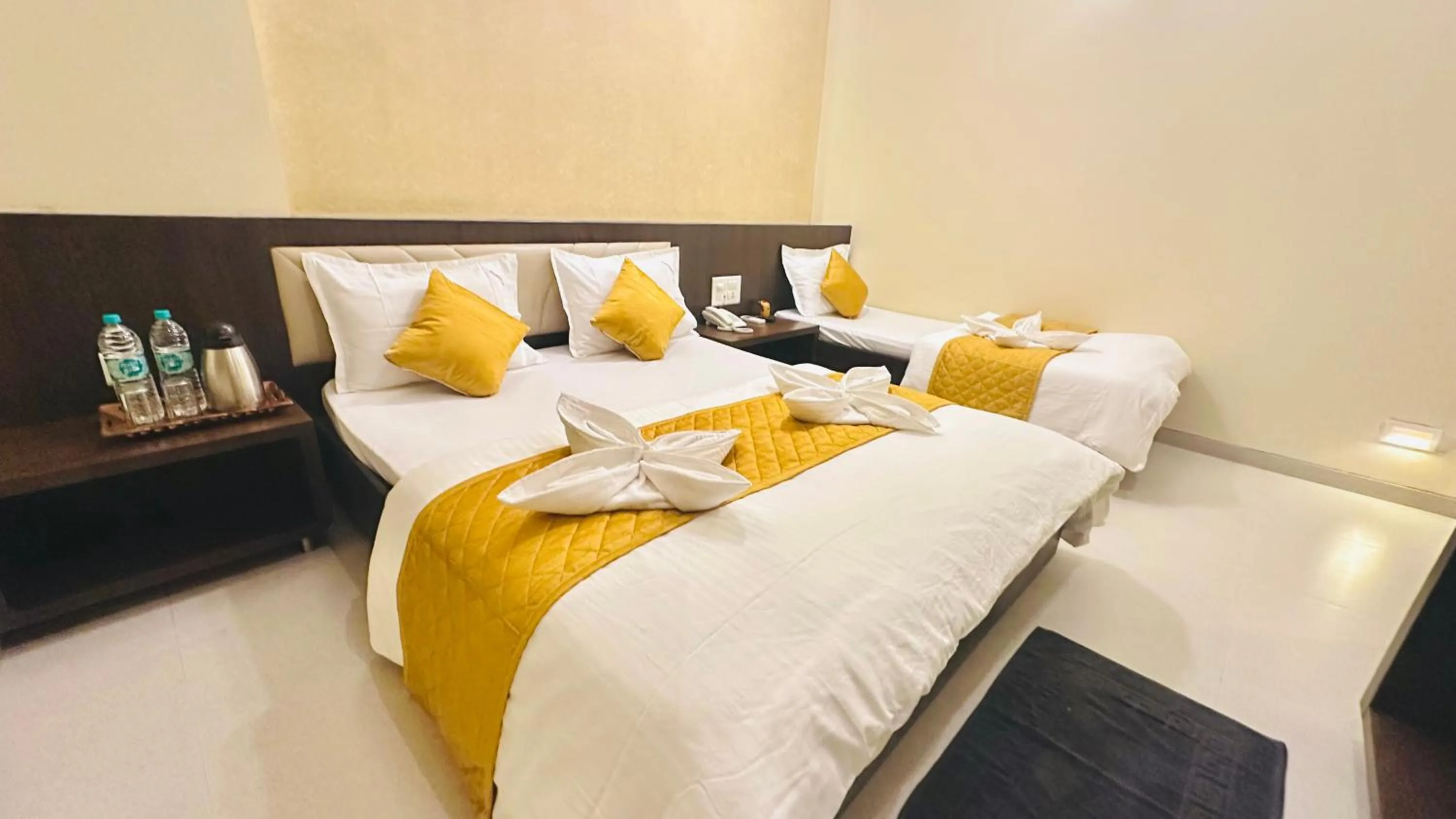 Bed in Hotel Sai Gurusthan