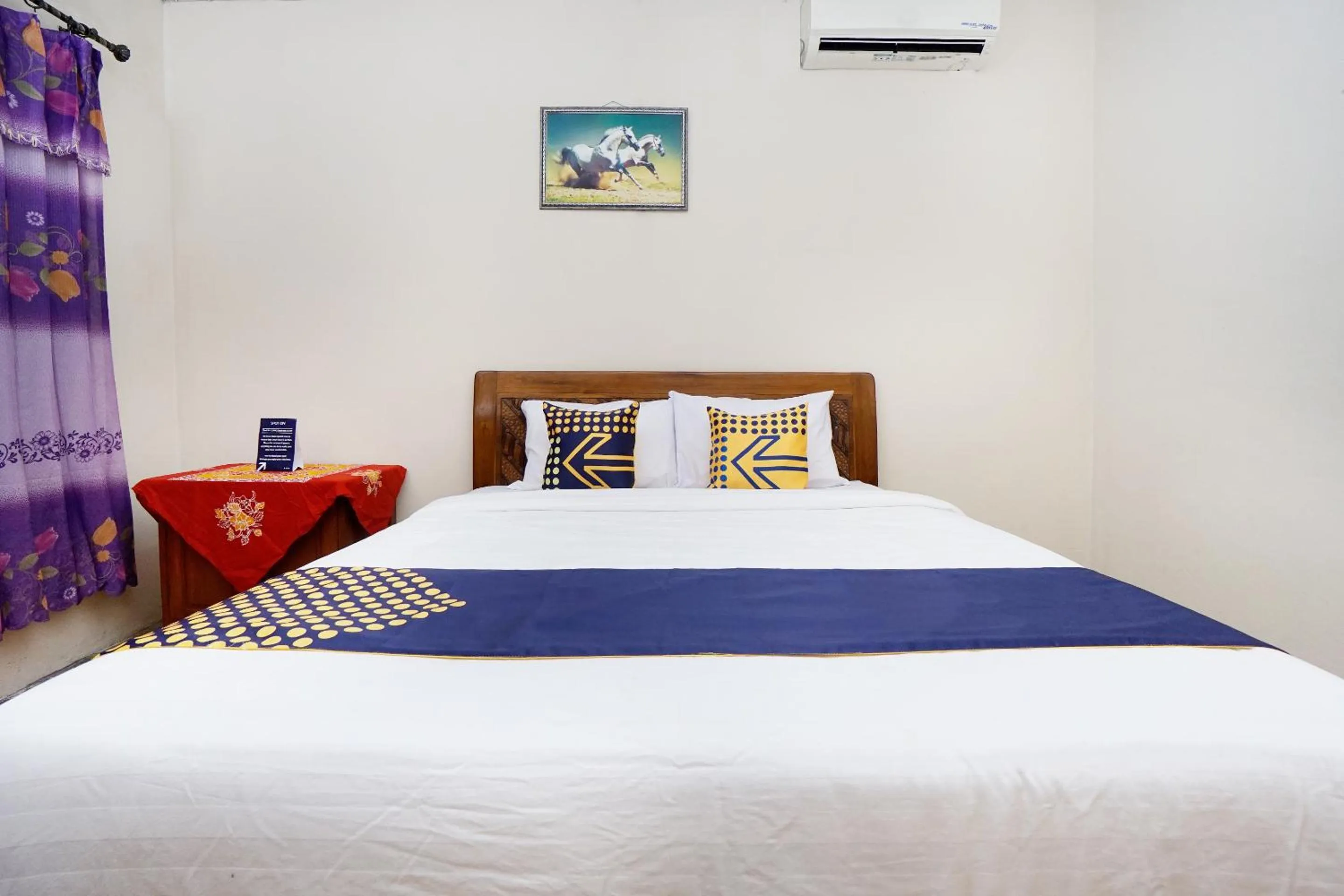 Bedroom in SPOT ON 2857 Hotel Pelangi