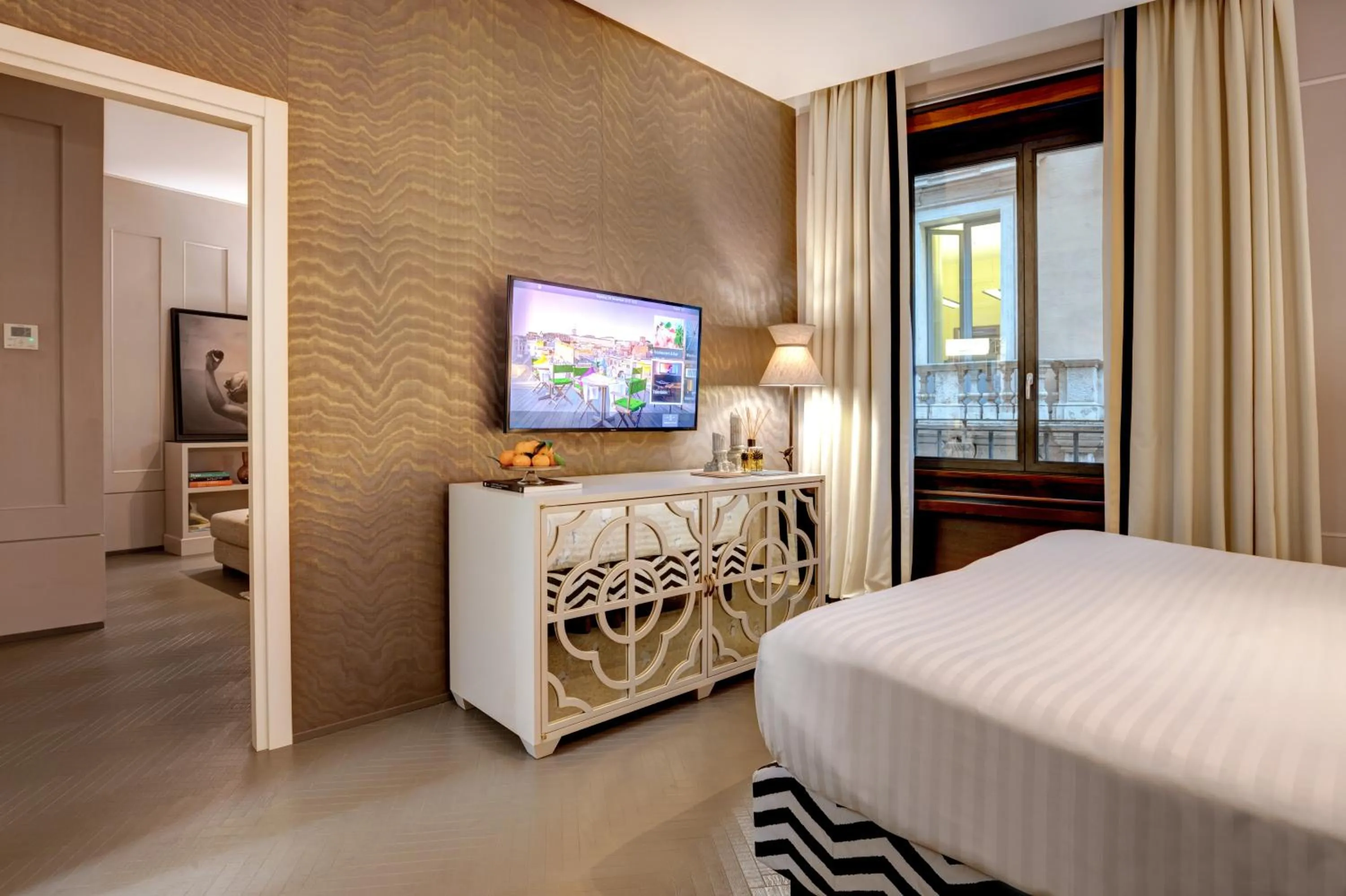 Bed in Singer Palace Hotel Roma