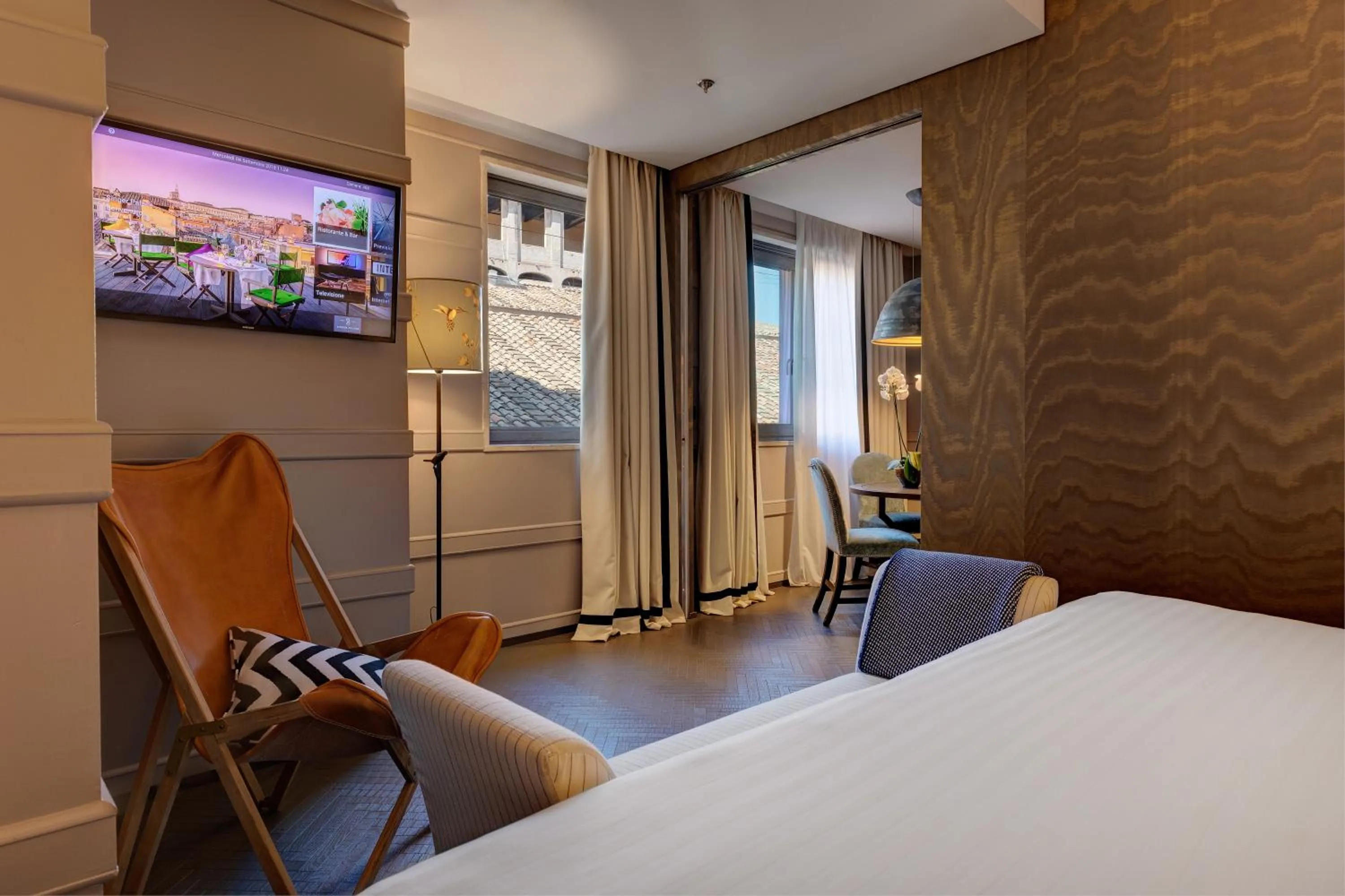 Bed in Singer Palace Hotel Roma