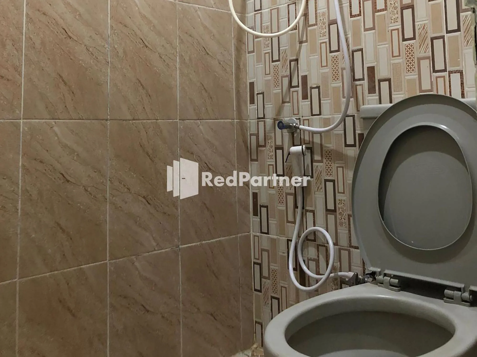 Bathroom in Seungit Syariah Inn Tebet Mitra RedDoorz