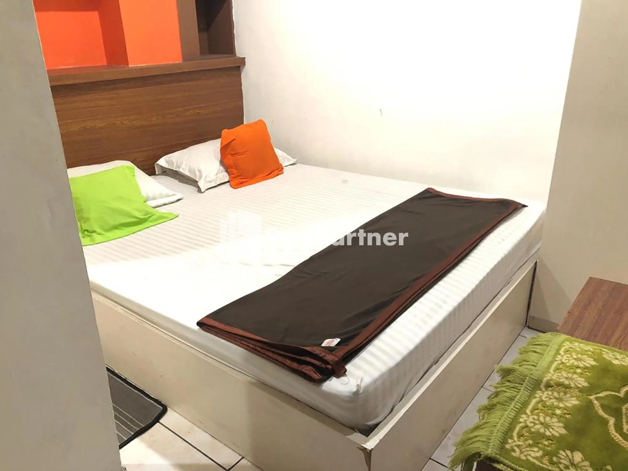 Bedroom, Bed in Seungit Syariah Inn Tebet Mitra RedDoorz