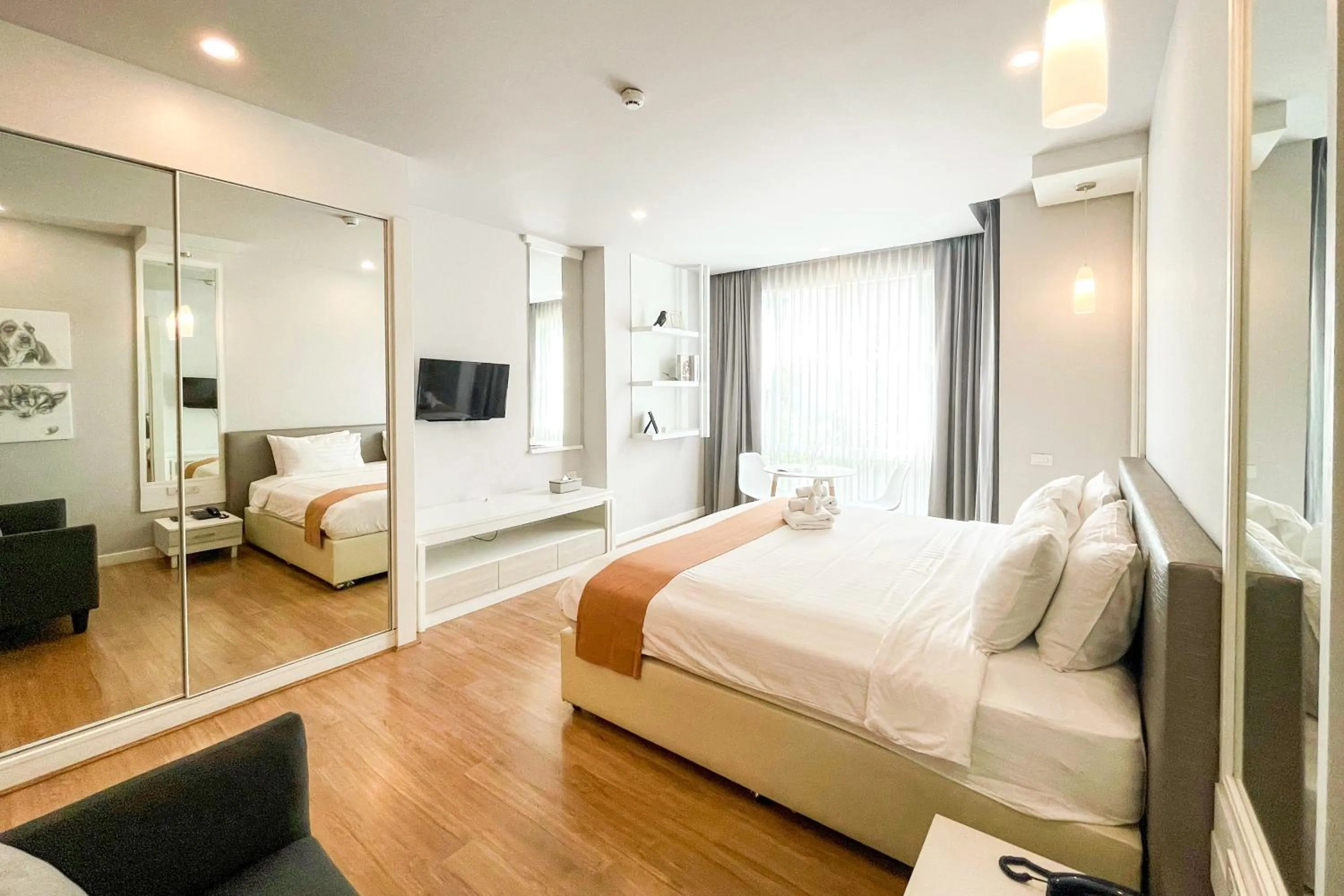 Bed in THE KANNAS Hotel & Serviced Apartment, Chiang Mai SHA Certified