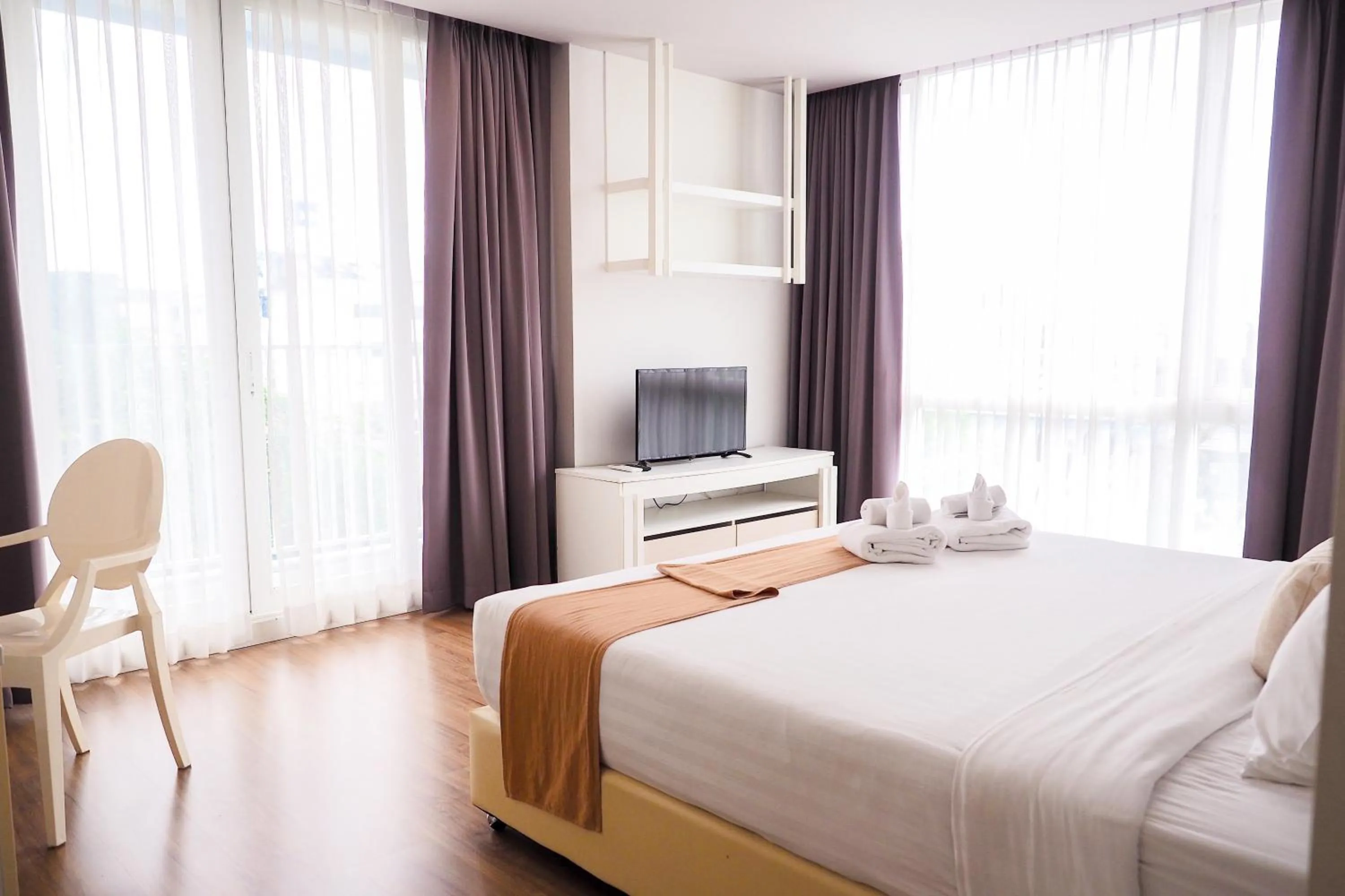 Bed in THE KANNAS Hotel & Serviced Apartment, Chiang Mai SHA Certified