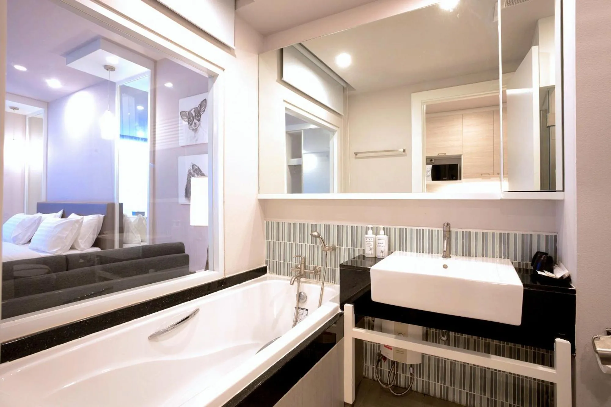 Toilet, Bed in THE KANNAS Hotel & Serviced Apartment, Chiang Mai SHA Certified