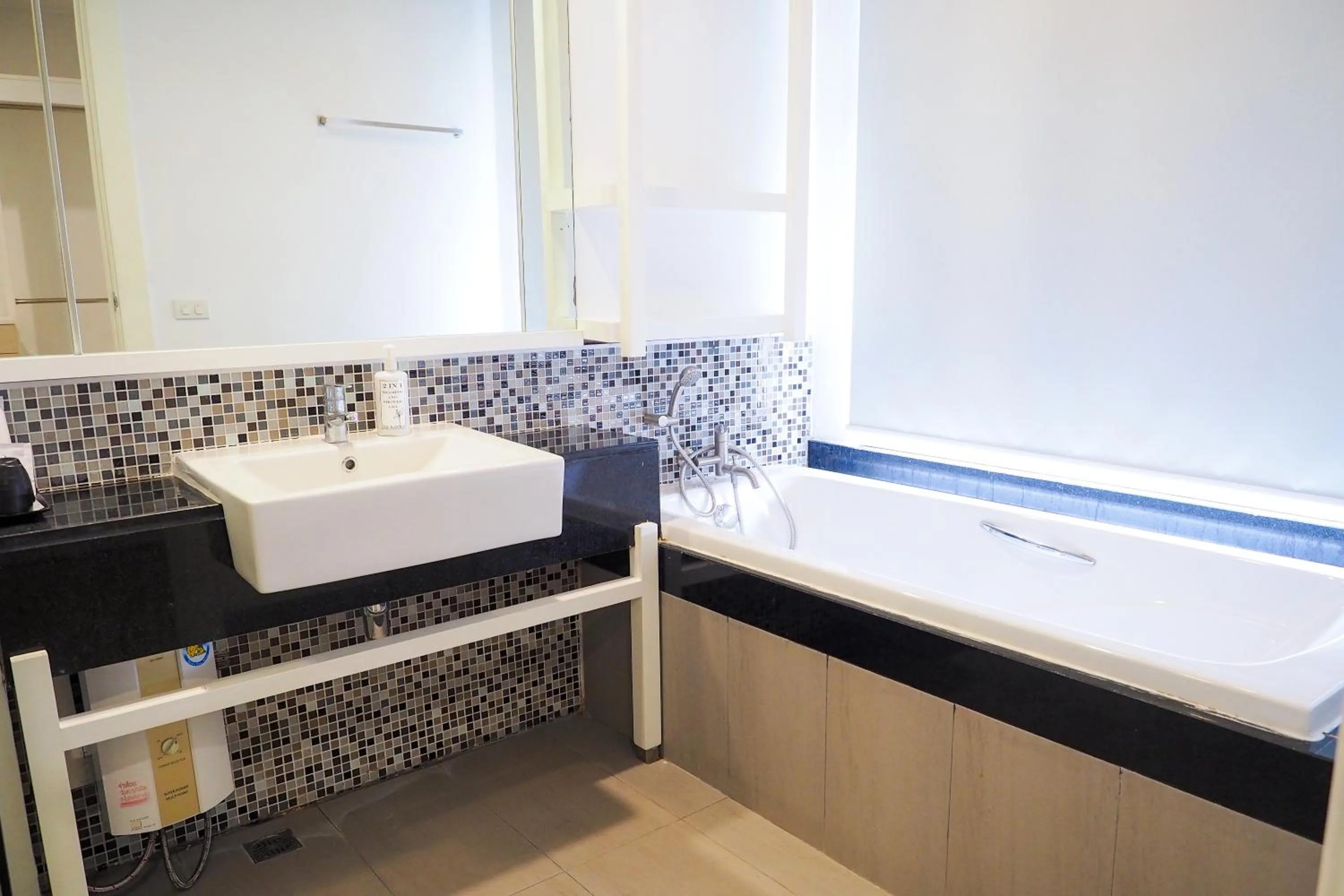 Bathroom in THE KANNAS Hotel & Serviced Apartment, Chiang Mai SHA Certified