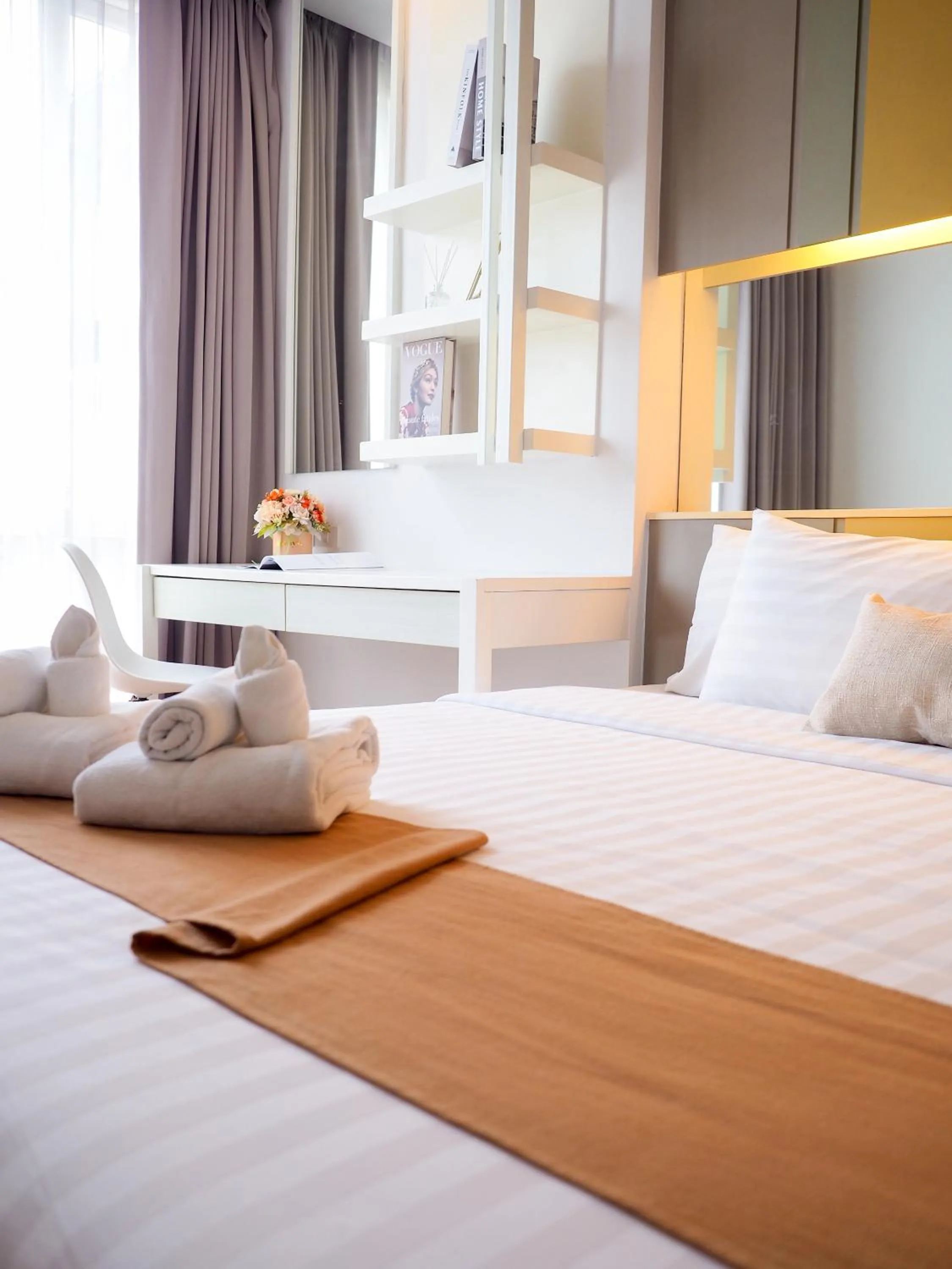 Bed in THE KANNAS Hotel & Serviced Apartment, Chiang Mai SHA Certified