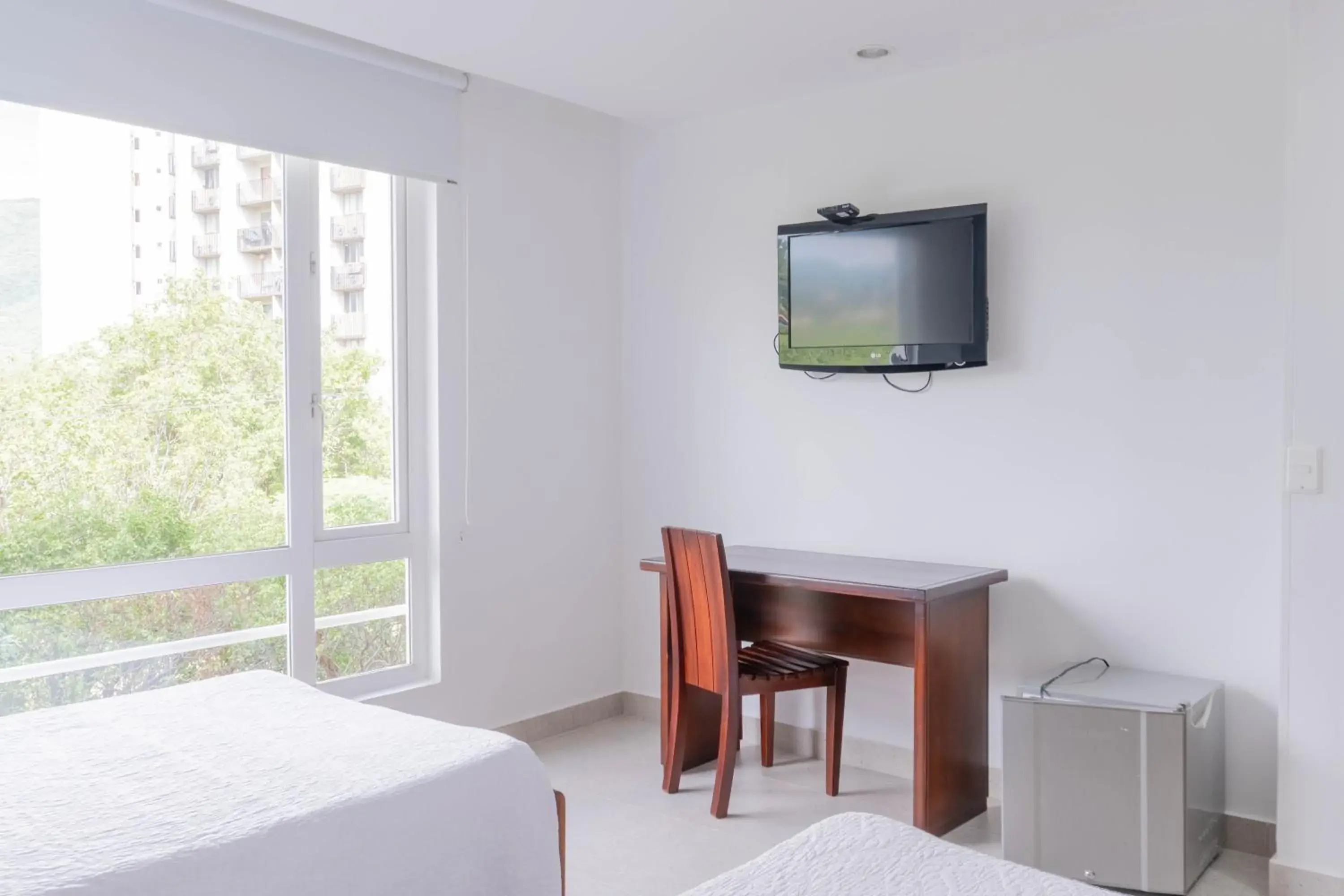 Photo of the whole room, Bed in Sanha Plus Hotel Photo of the whole room, Bed in Sanha Plus Hotel