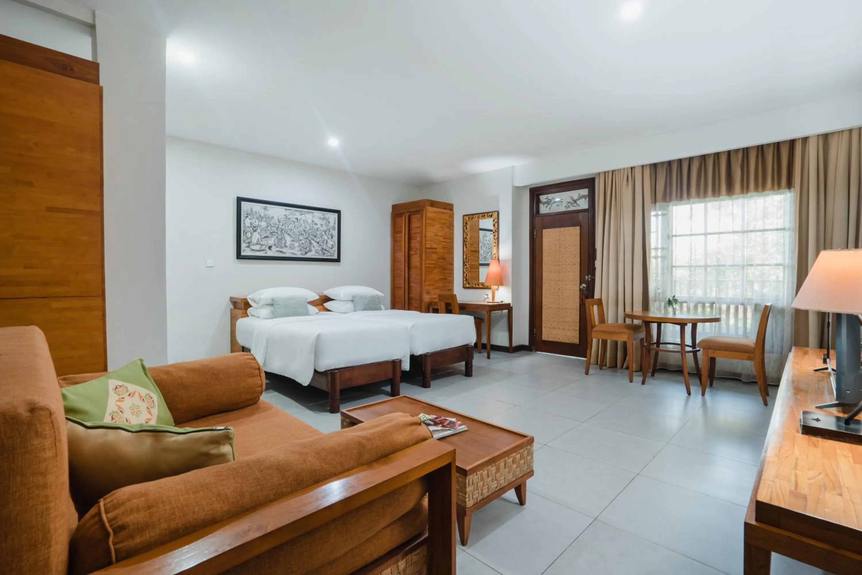 Living room, Bed in Ramayana Candidasa Beach Resort