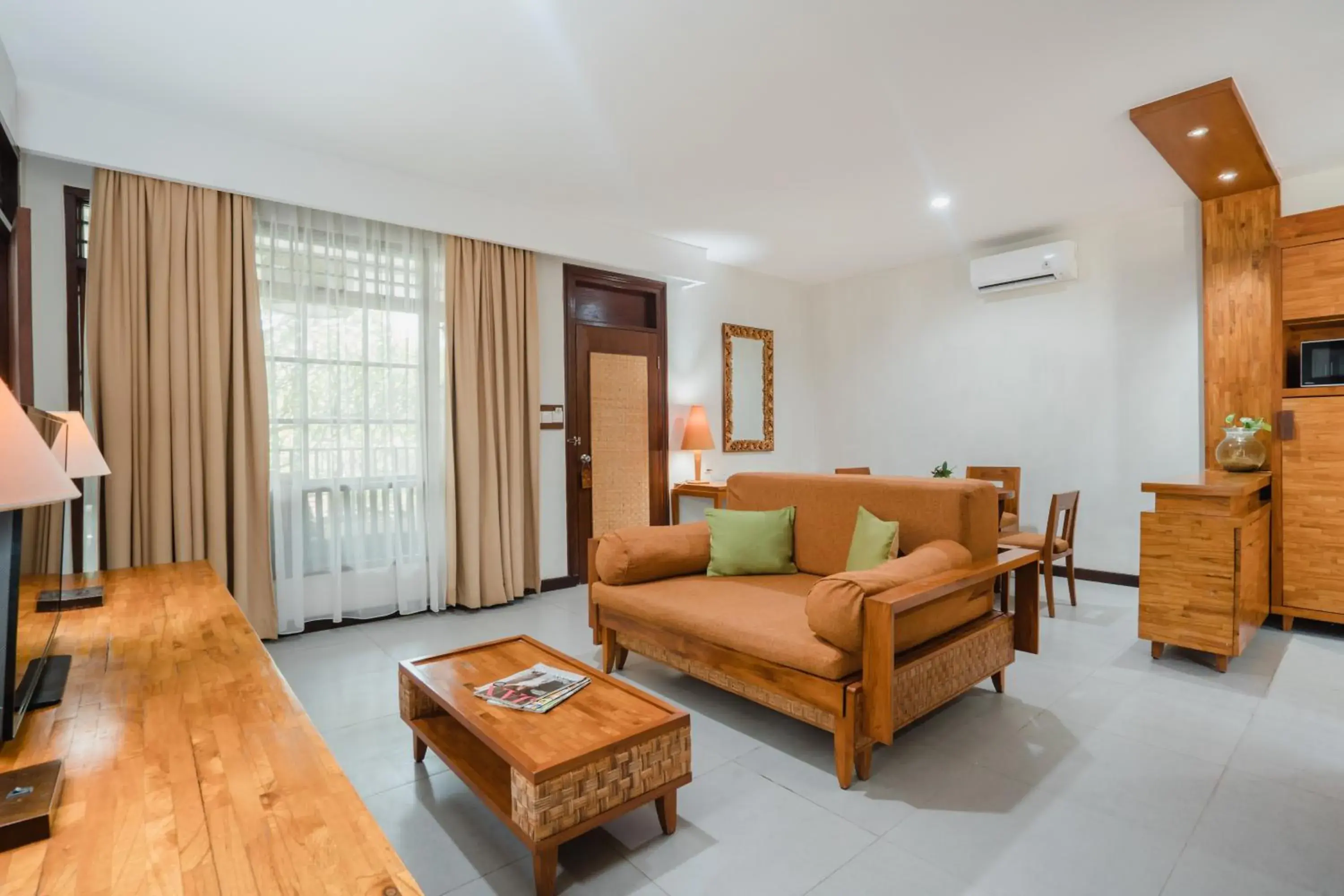 Living room in Ramayana Candidasa Beach Resort Living room in Ramayana Candidasa Beach Resort