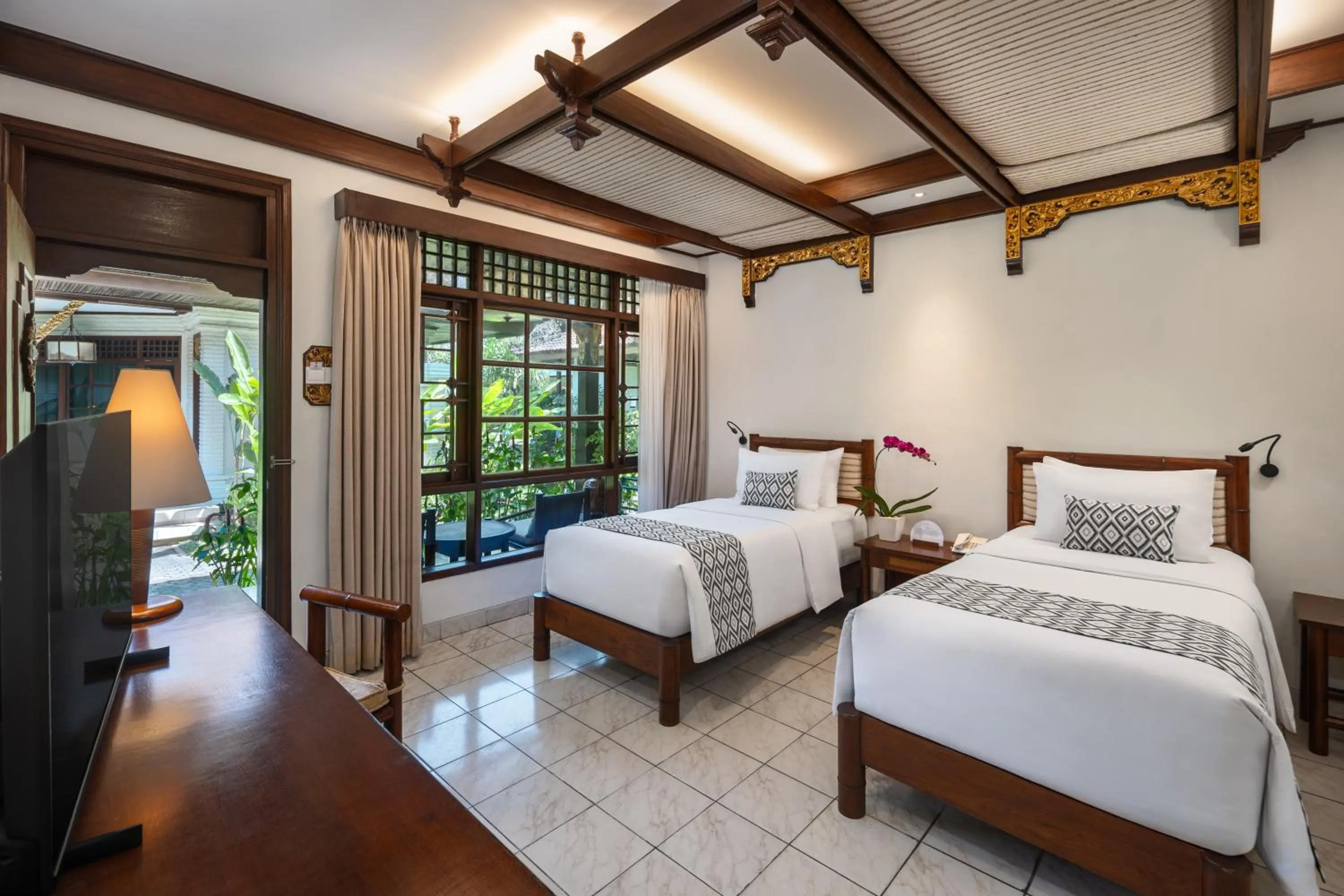 Bed in Ramayana Candidasa Beach Resort